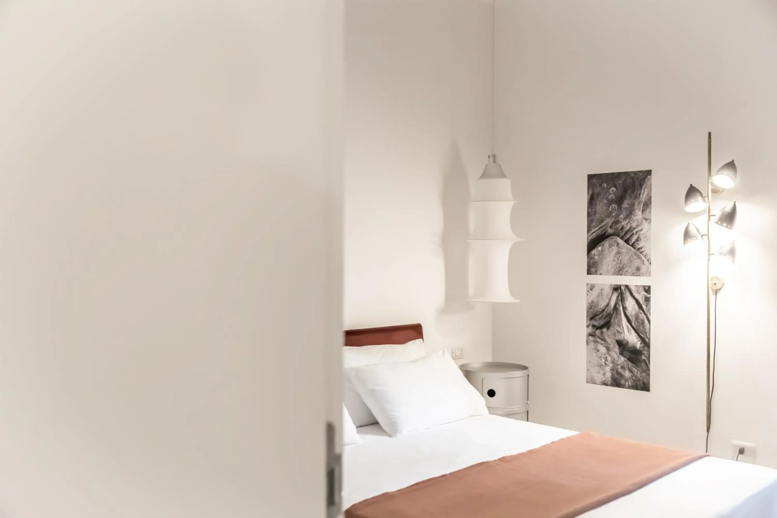 Bed in Hotel Dolomiti