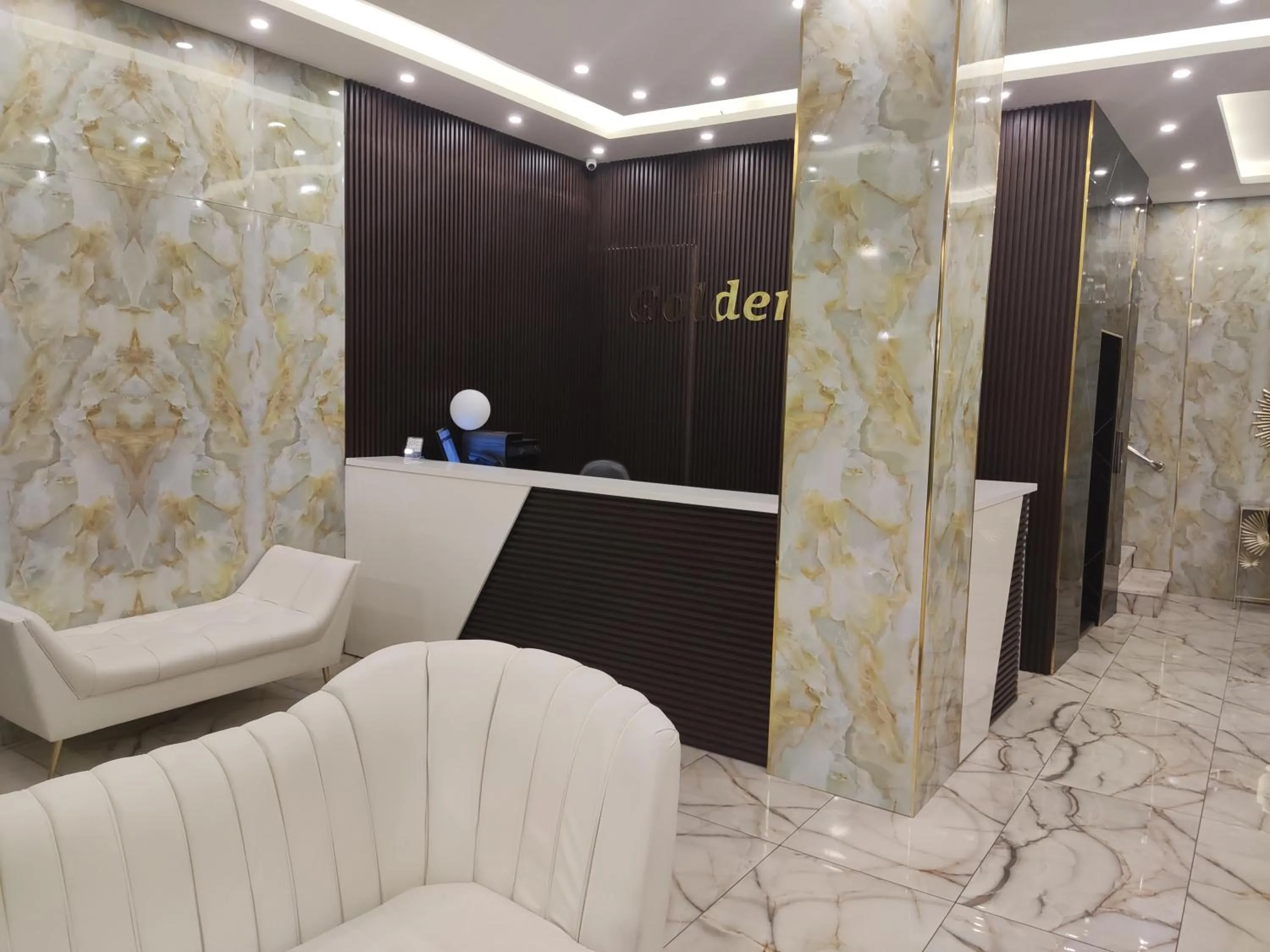 Lobby or reception in Golden Hotel