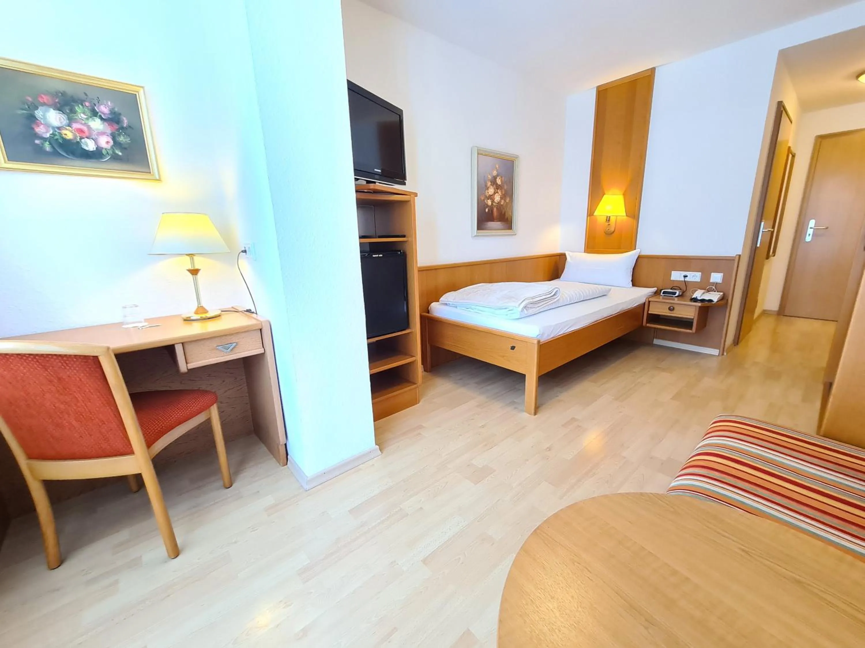 Photo of the whole room, Bed in Thermenhotel Tannenhof - Ihr Wohlfühl-Hotel