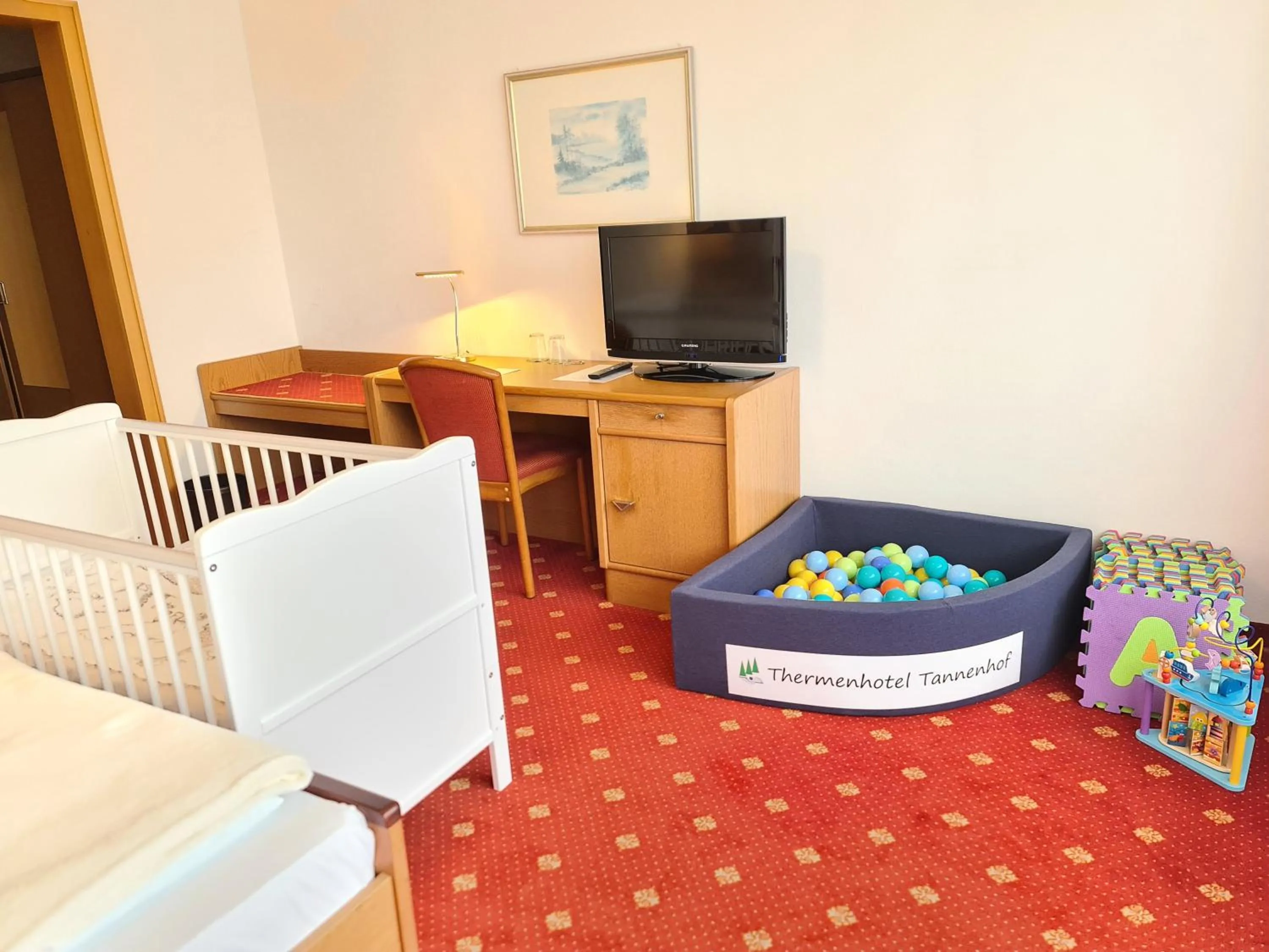 Living room, Bed in Thermenhotel Tannenhof - Ihr Wohlfühl-Hotel