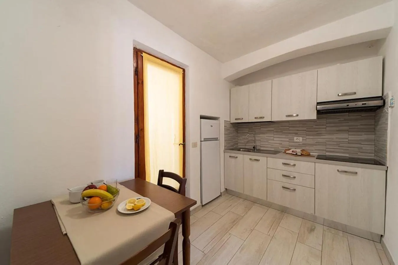 Kitchen or kitchenette in Appartamenti Villa Miramare