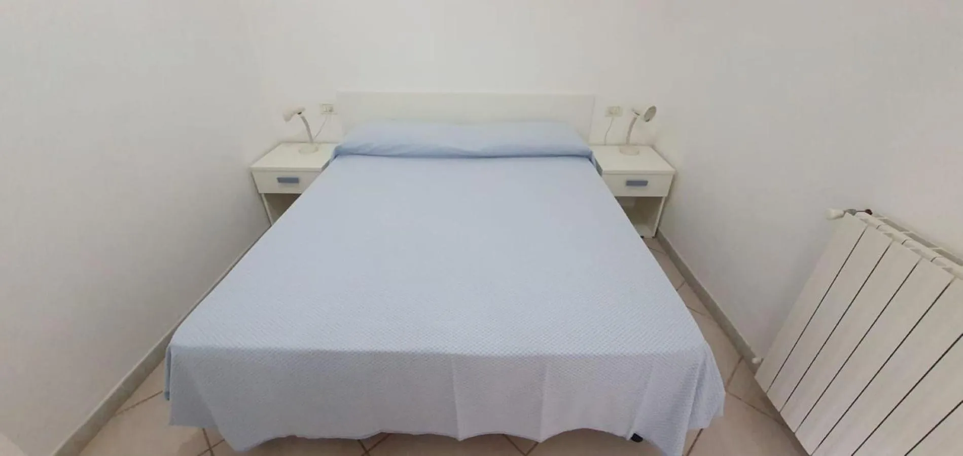 Bed in Appartamenti Villa Miramare