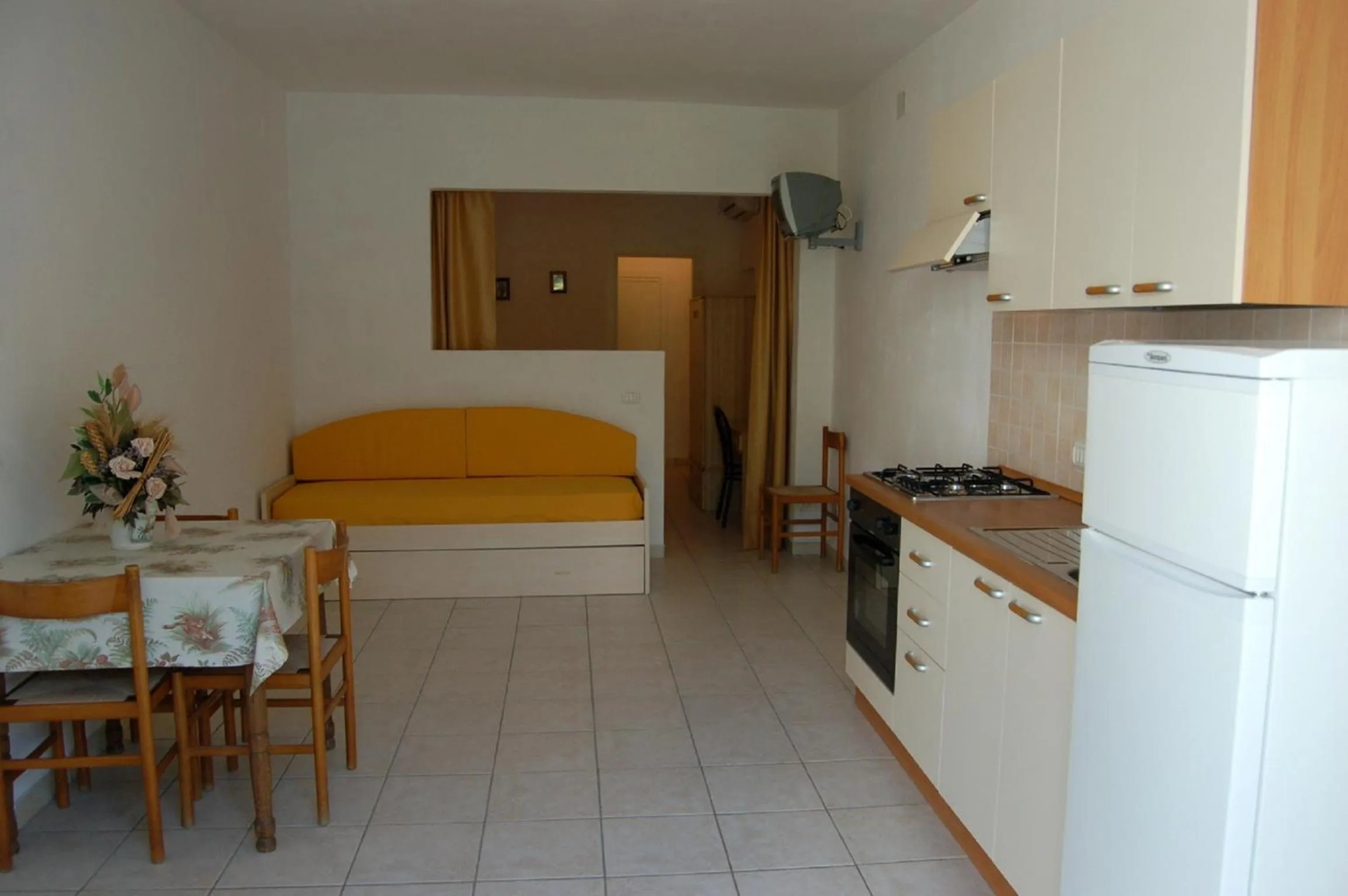 Kitchen or kitchenette, Bed in Appartamenti Villa Miramare