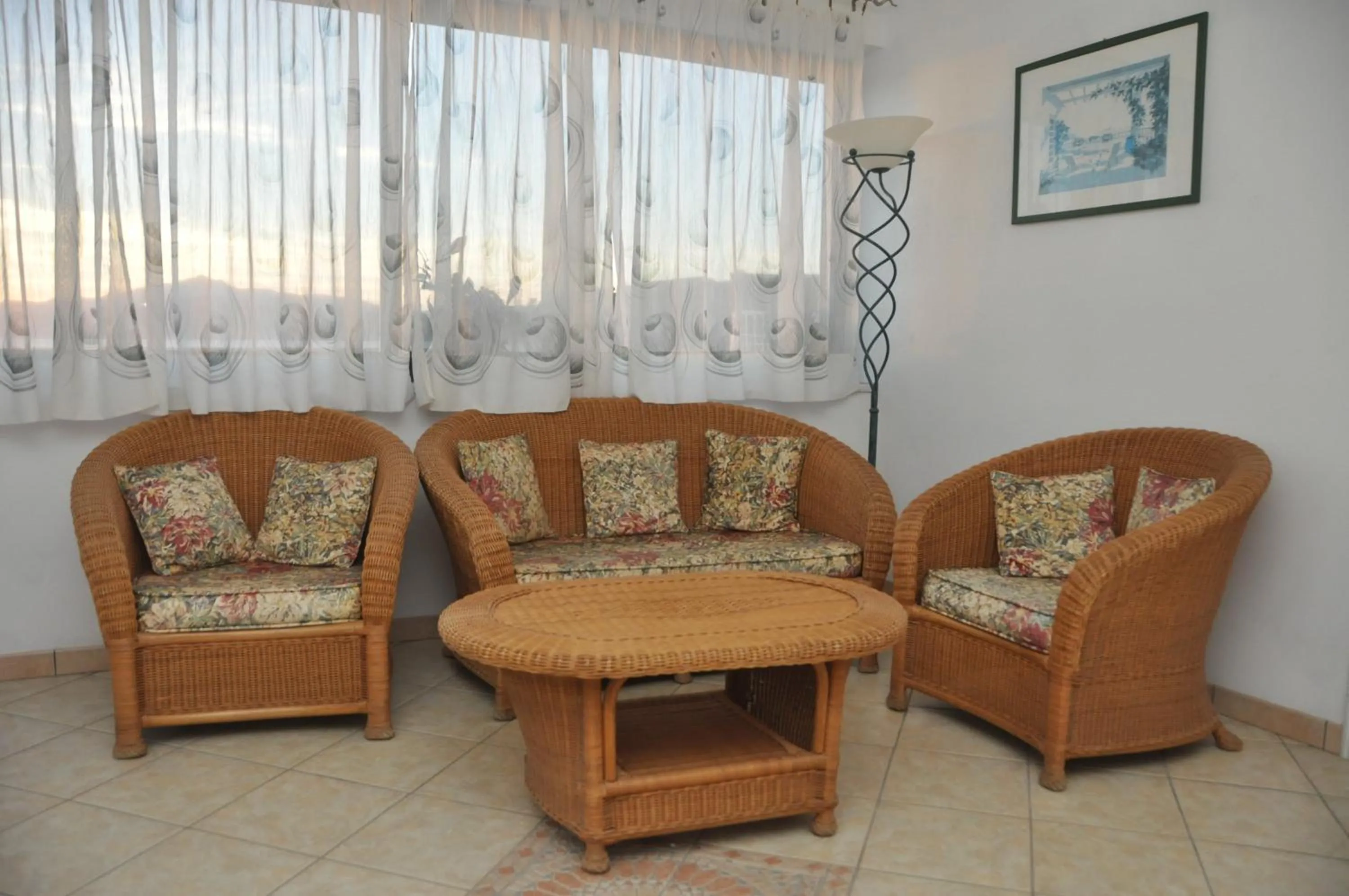 Communal lounge/ TV room in Appartamenti Villa Miramare