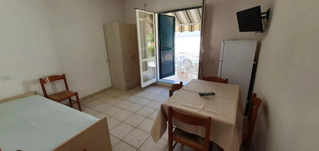 Living room, Bed in Appartamenti Villa Miramare