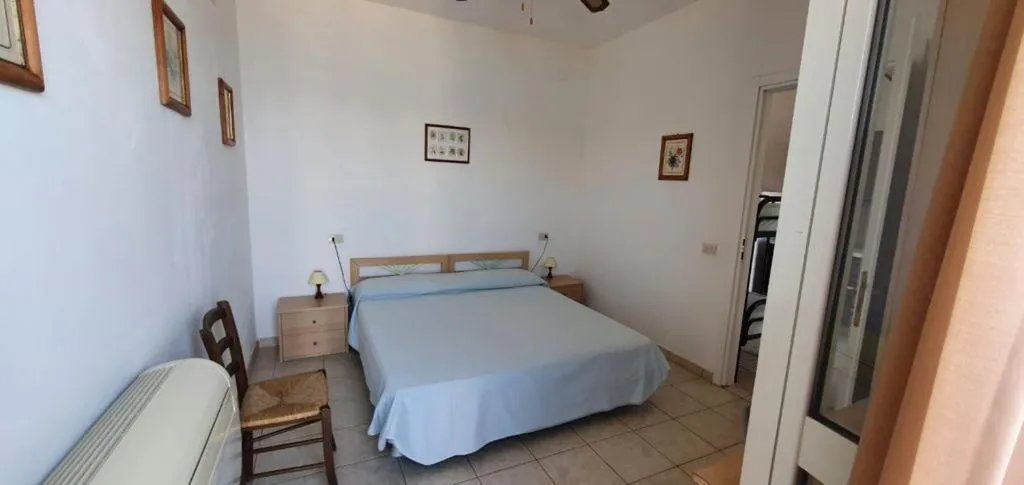 Bedroom, Bed in Appartamenti Villa Miramare