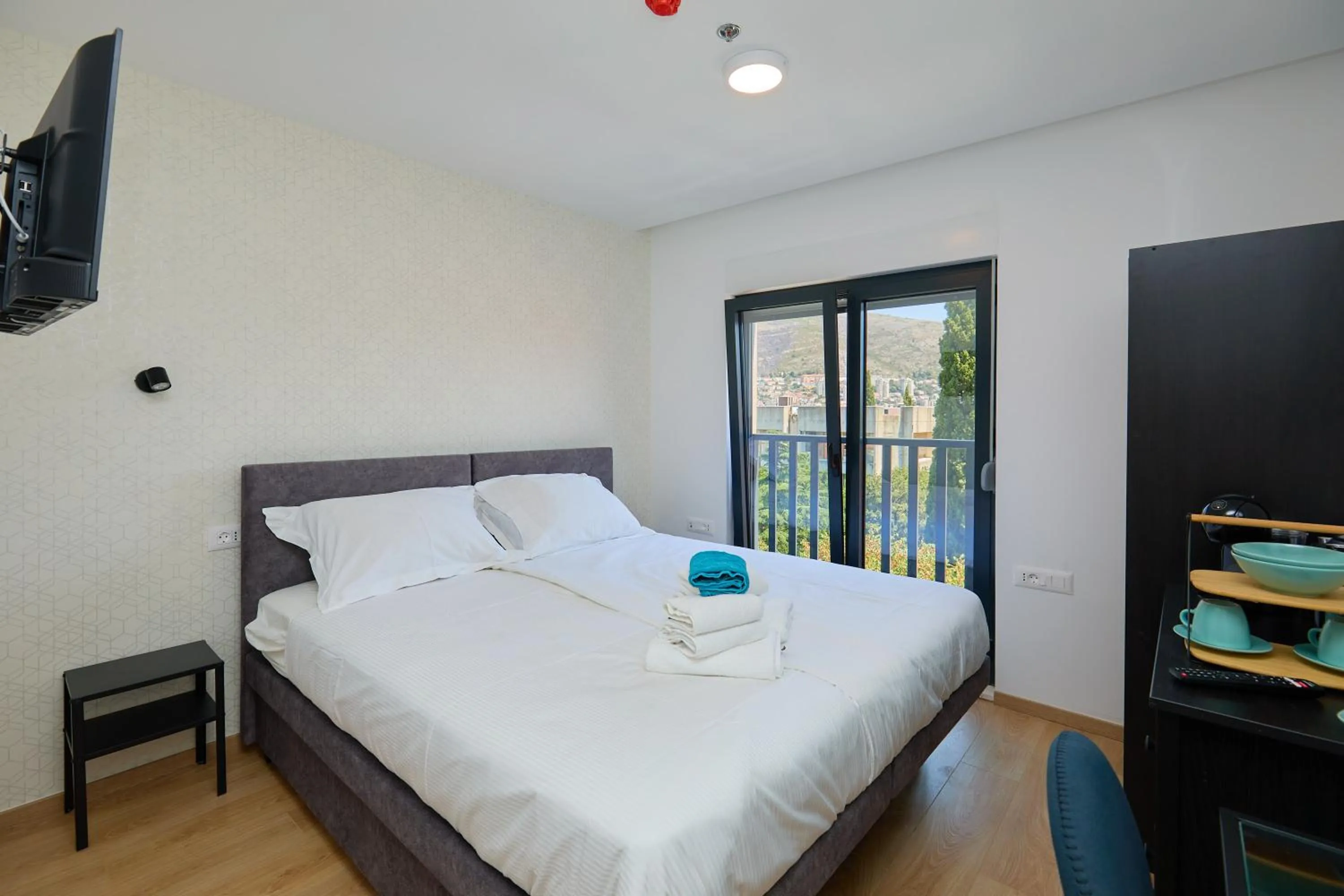 Bed in DOMINIUM CITY SUITES