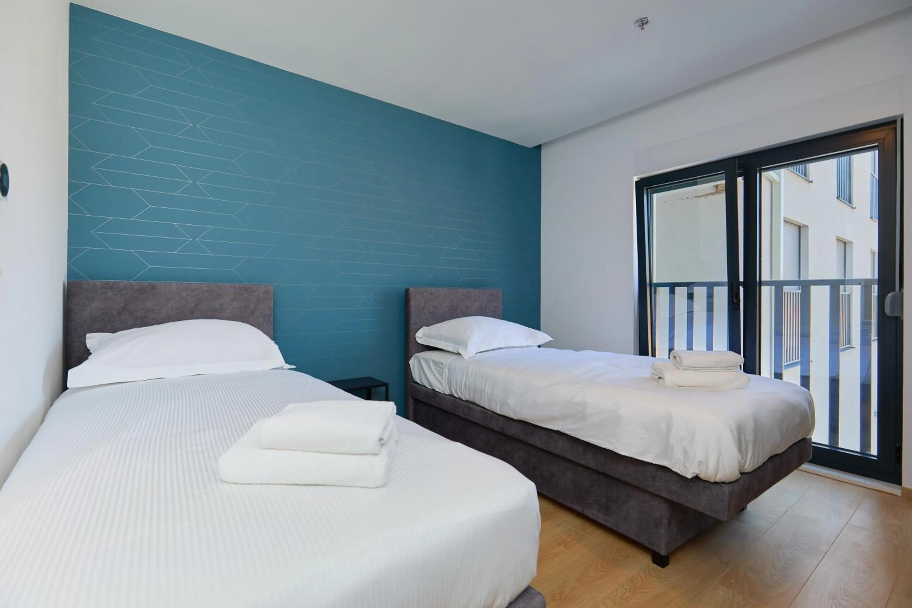 Bed in DOMINIUM CITY SUITES