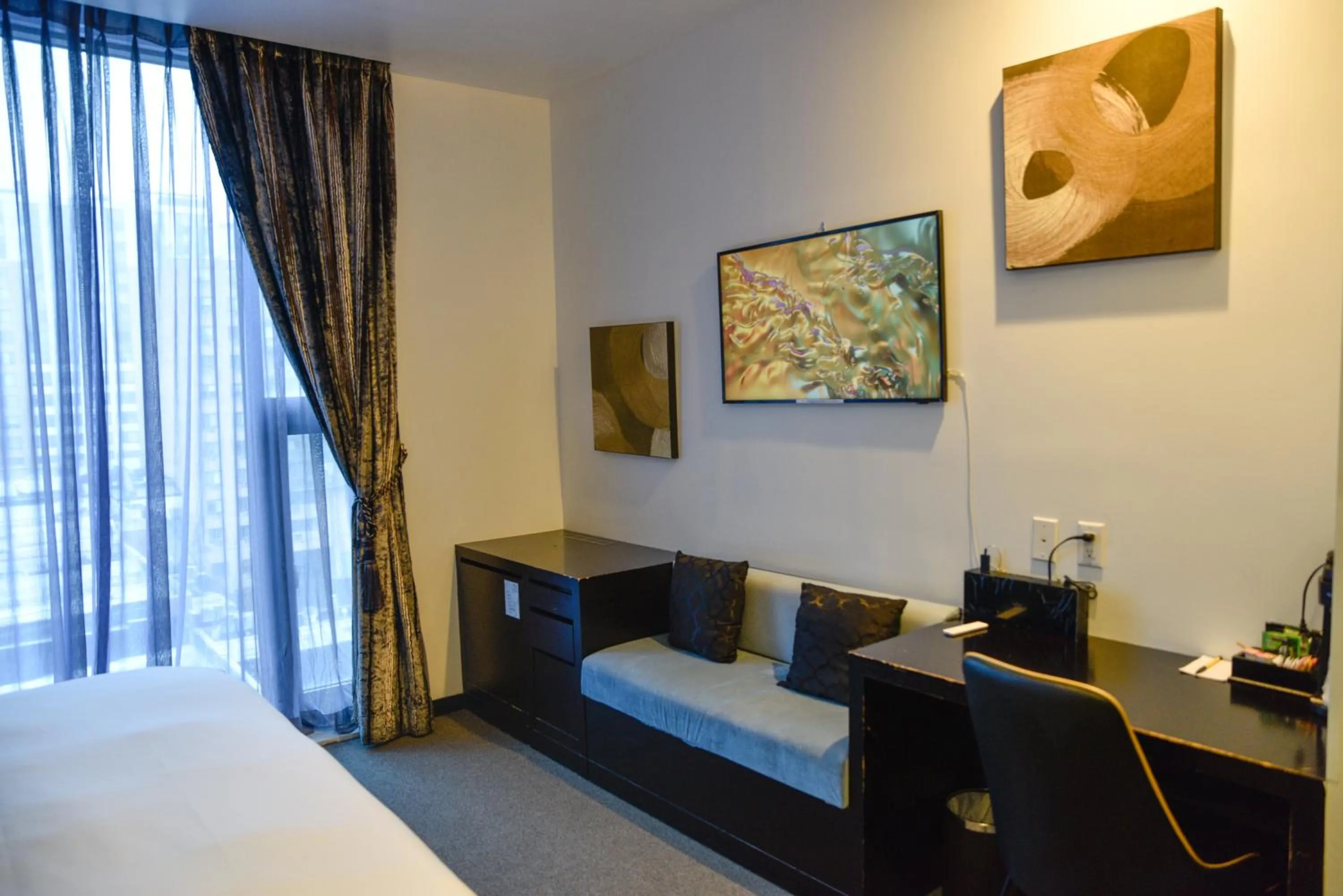 TV and multimedia, Bed in The One Boutique Hotel