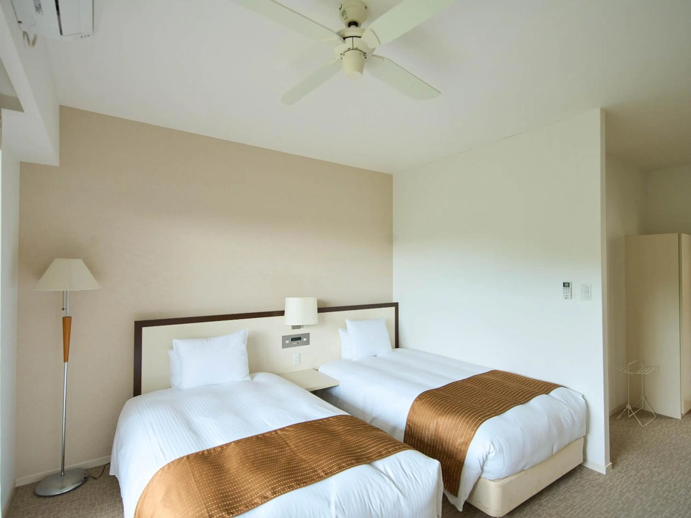 Photo of the whole room, Bed in Hotel Holistic Resort Wakayama