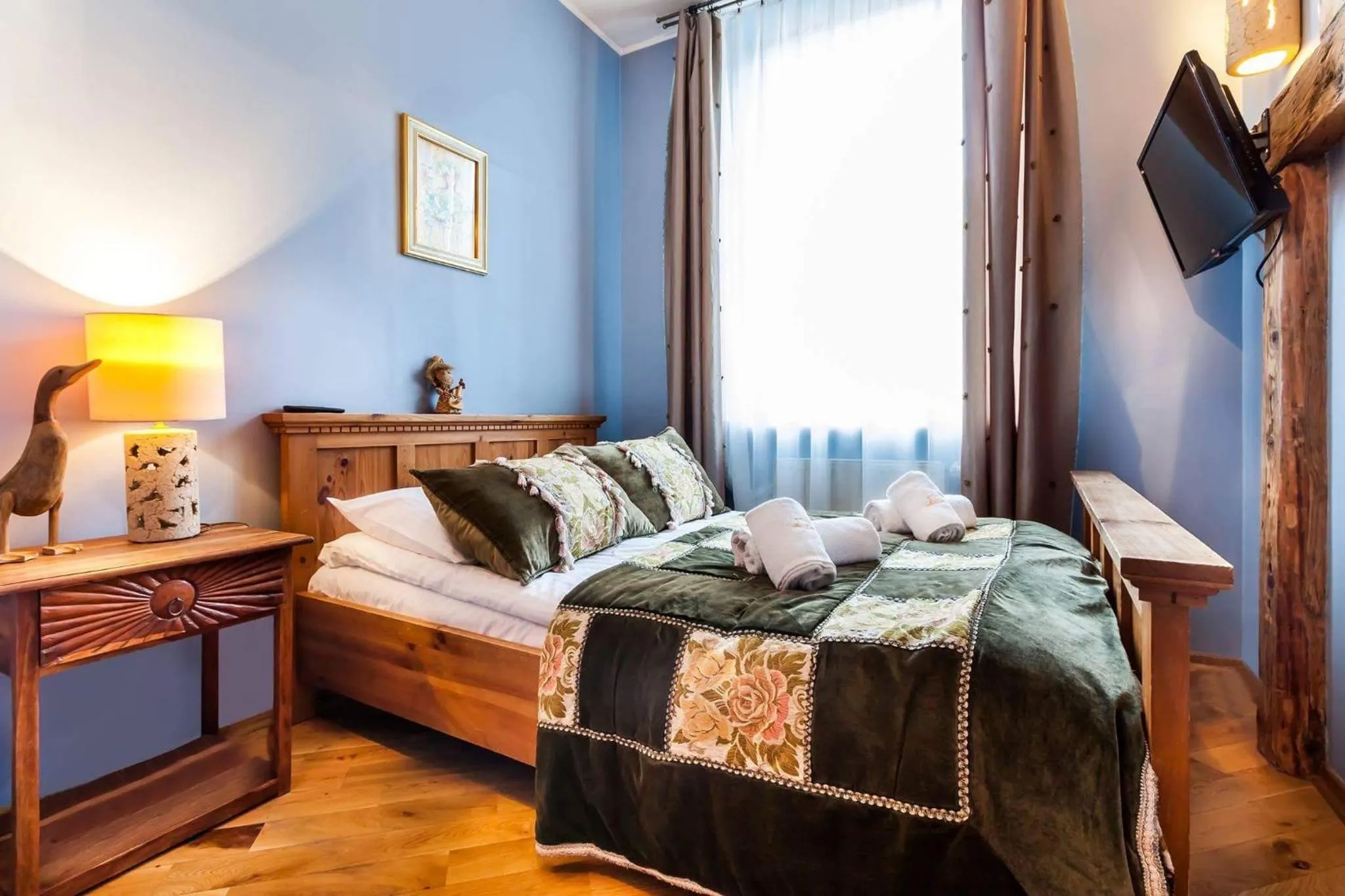 Bed in Aparthotel Oberża