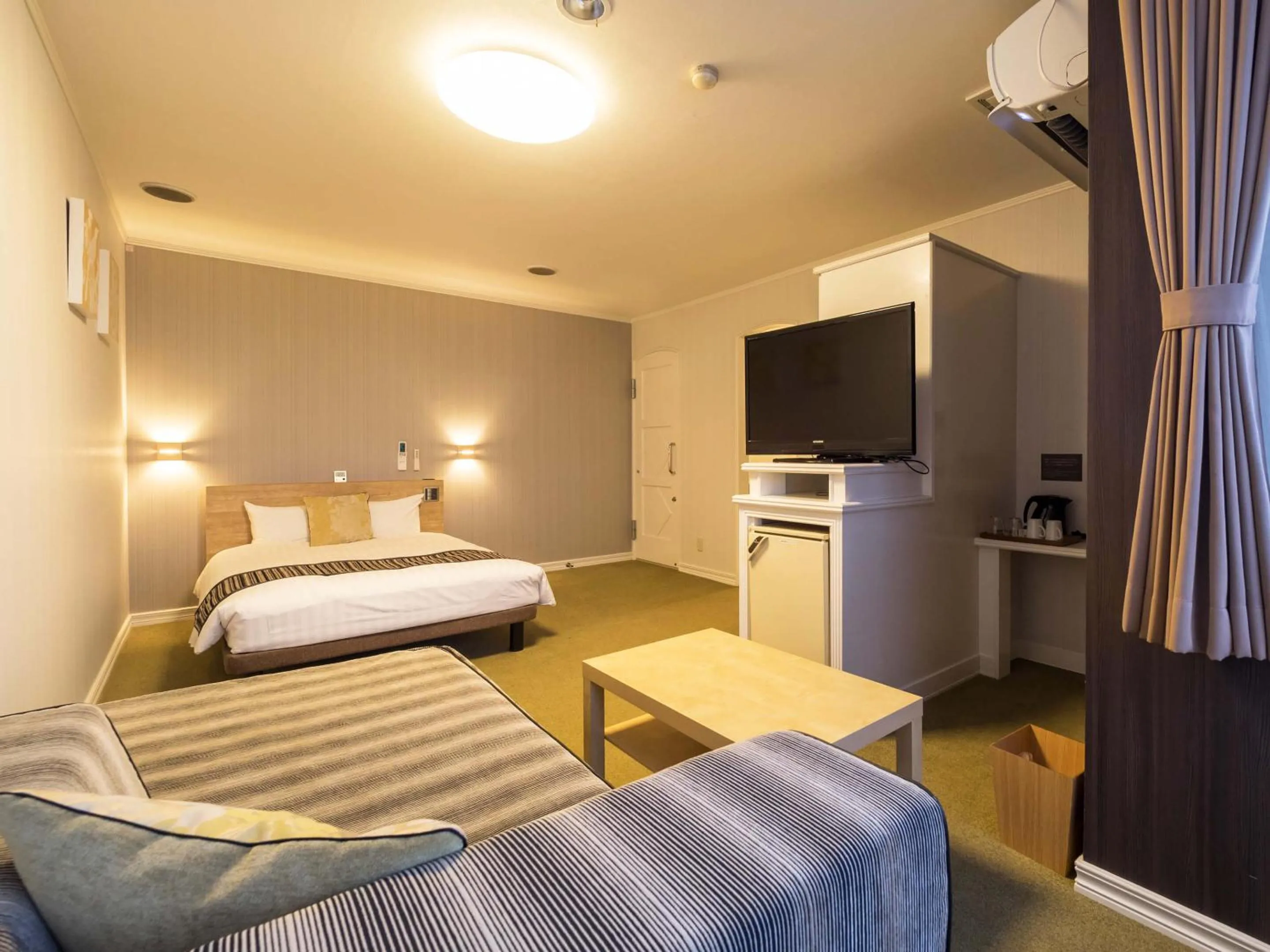 Photo of the whole room, Bed in Hotel AreaOne Obihiro