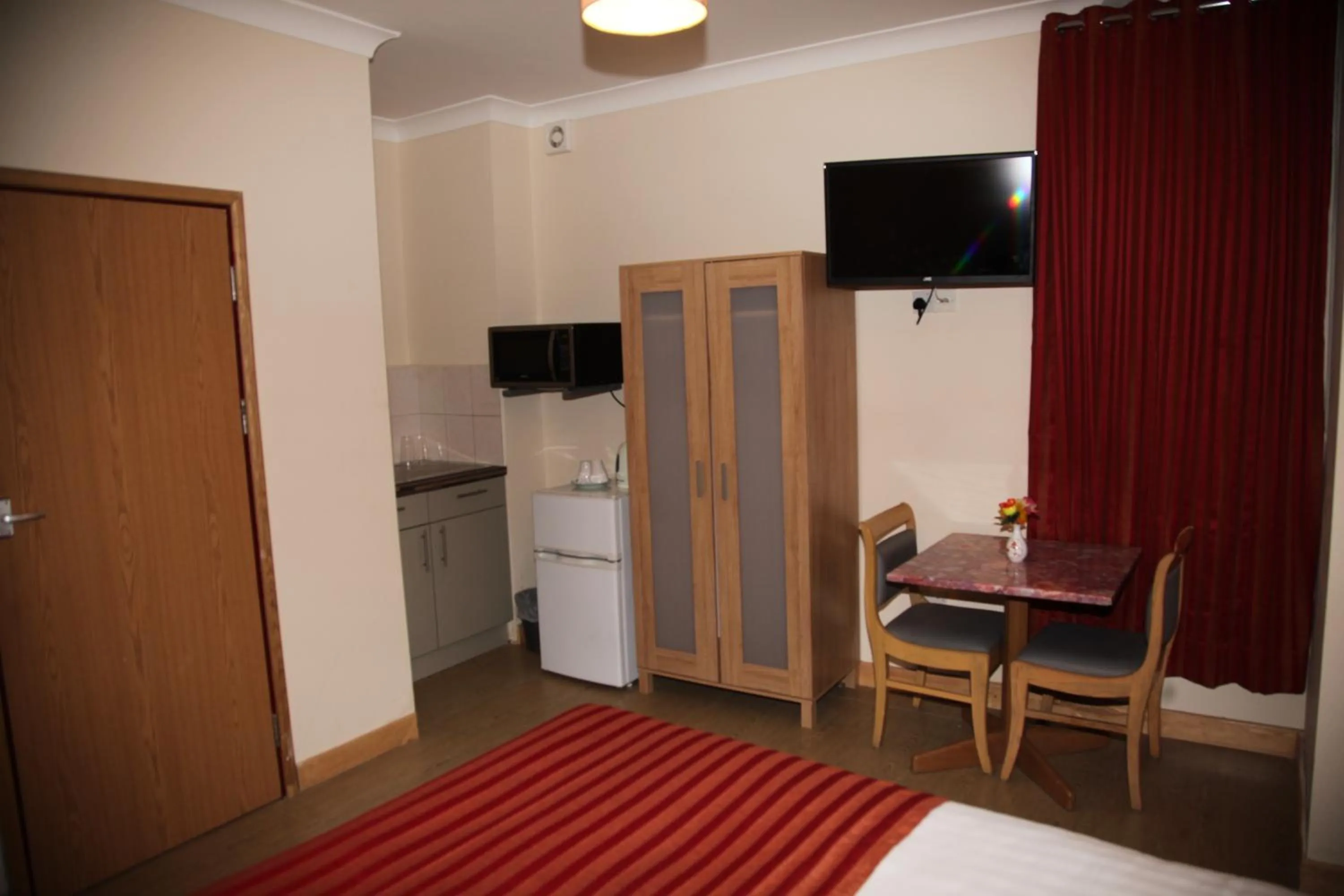 Decorative detail, Bed in Grove Apartments