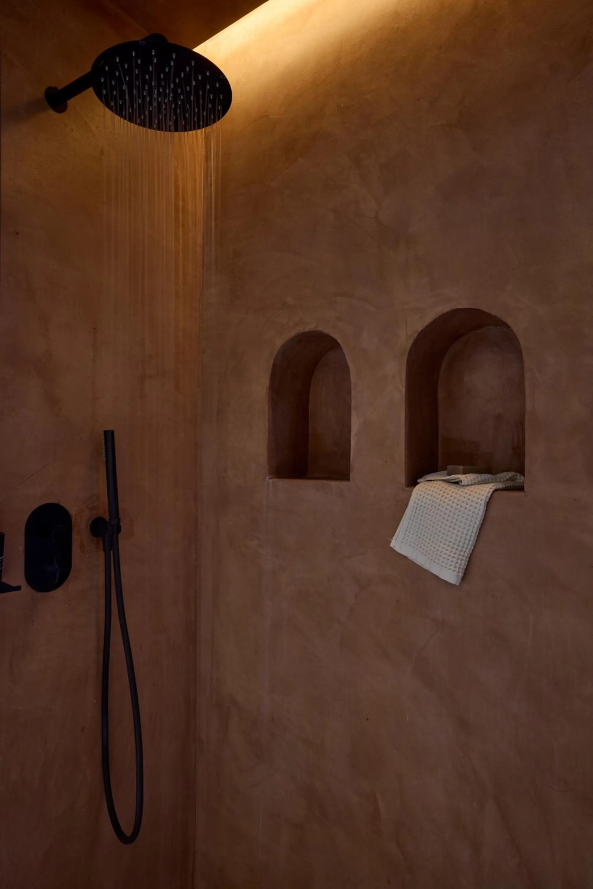 Shower in KOIA All - Suite Well Being Resort - Adults Only