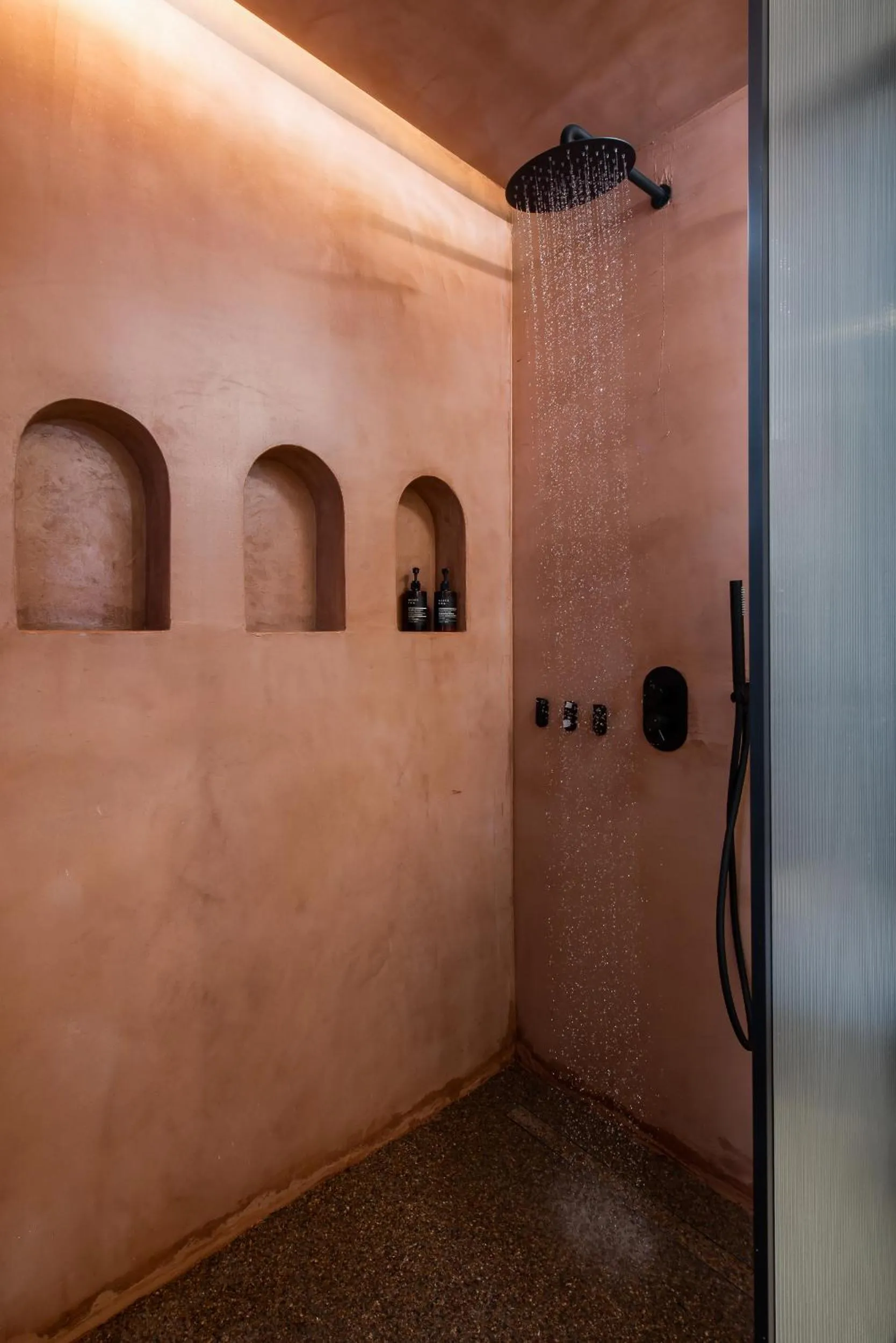 Shower in KOIA All - Suite Well Being Resort - Adults Only