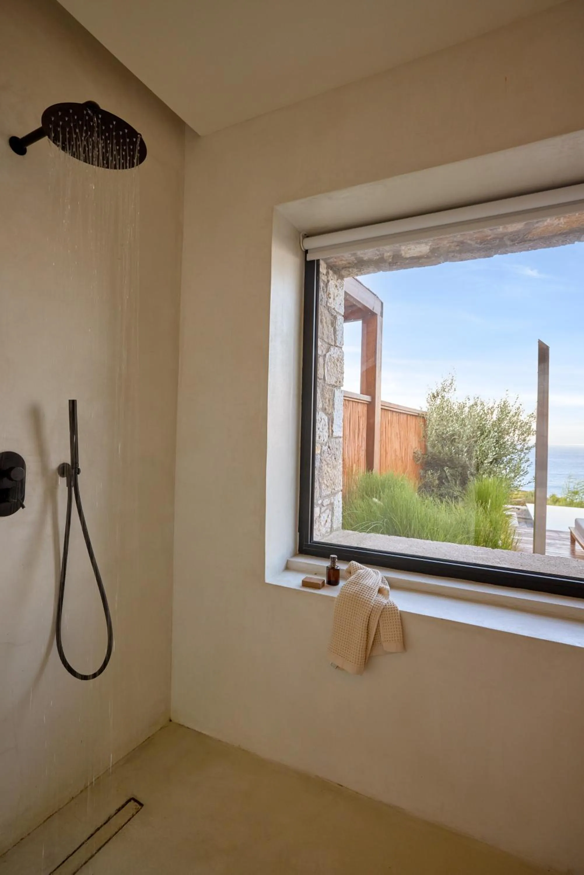 Shower in KOIA All - Suite Well Being Resort - Adults Only