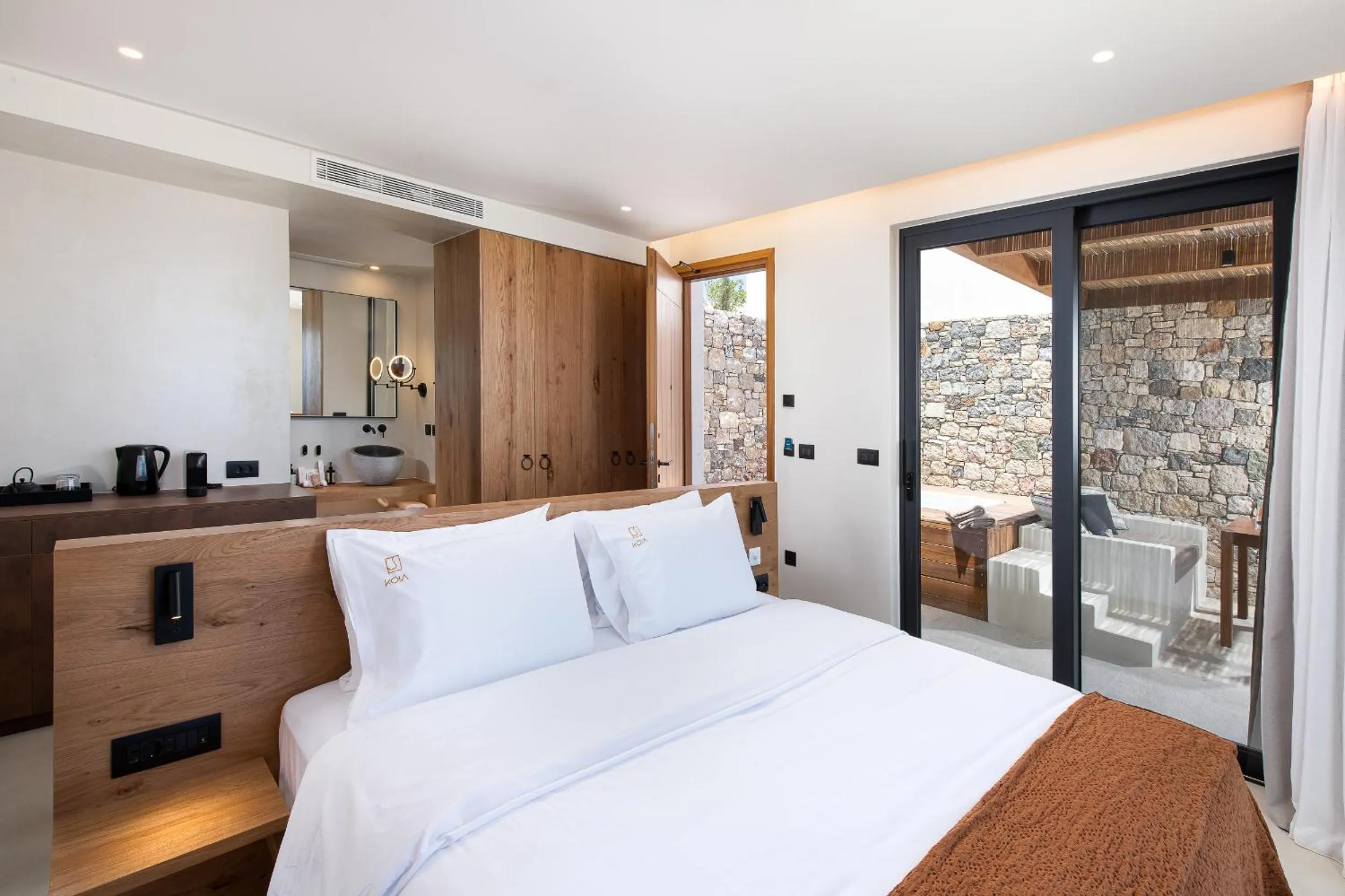 Bed in KOIA All - Suite Well Being Resort - Adults Only