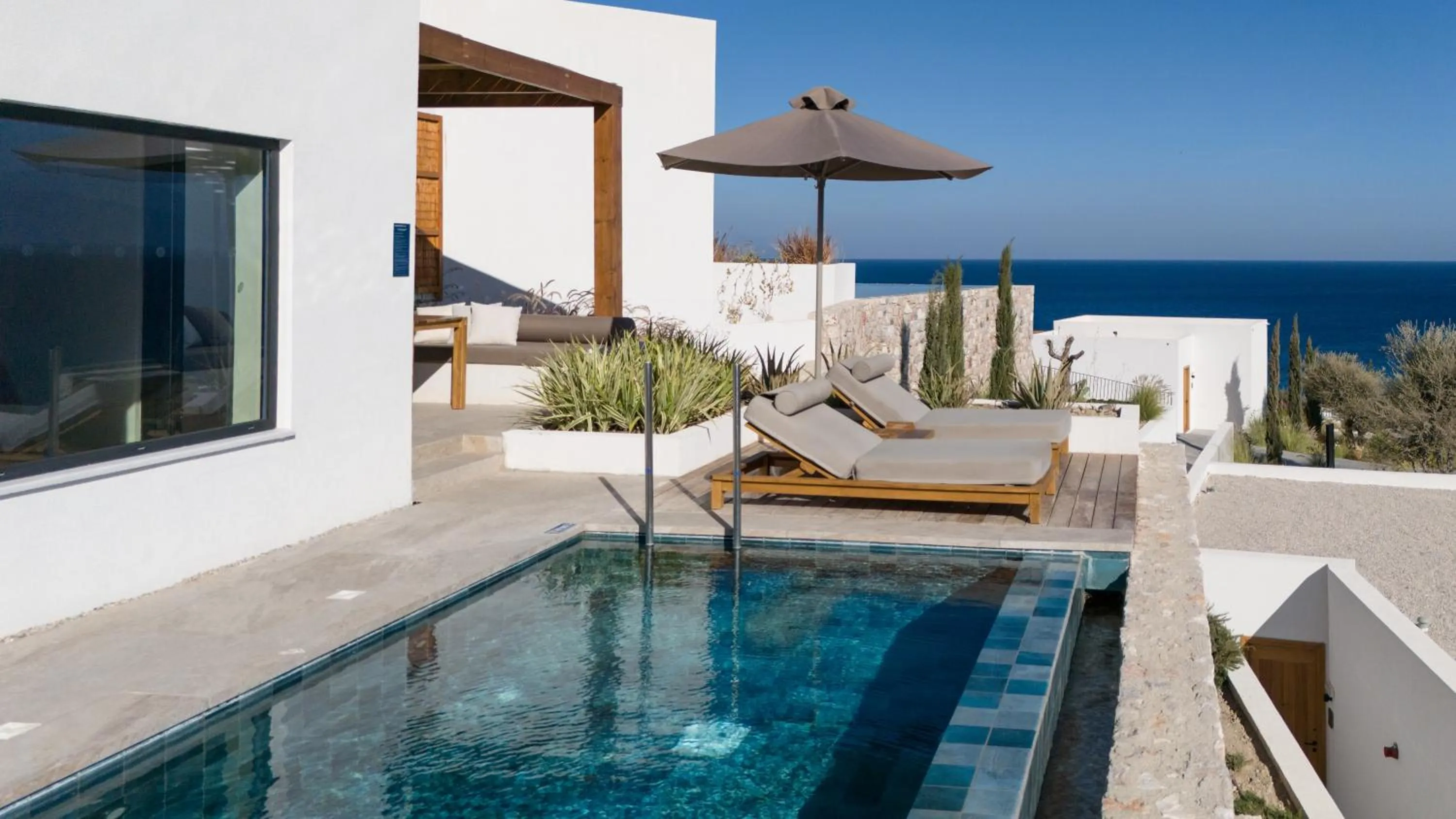 Swimming pool in KOIA All - Suite Well Being Resort - Adults Only