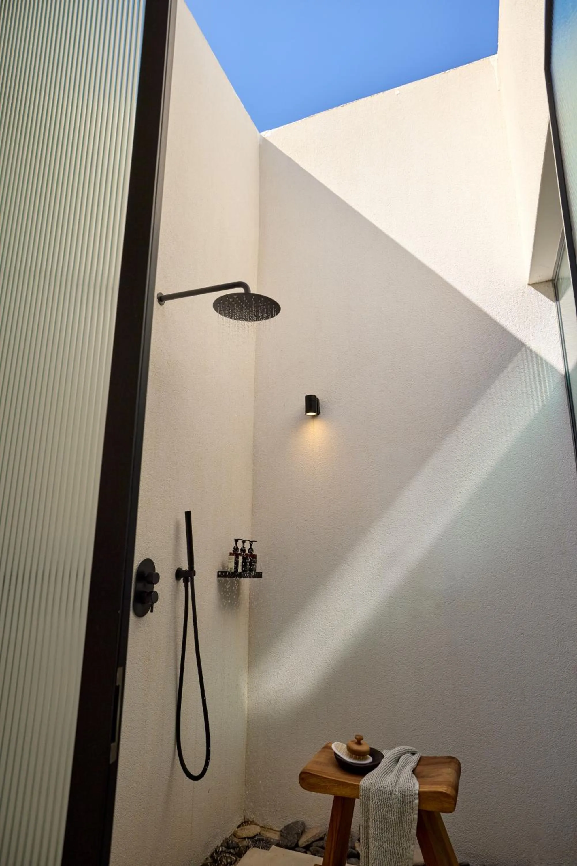 Shower in KOIA All - Suite Well Being Resort - Adults Only