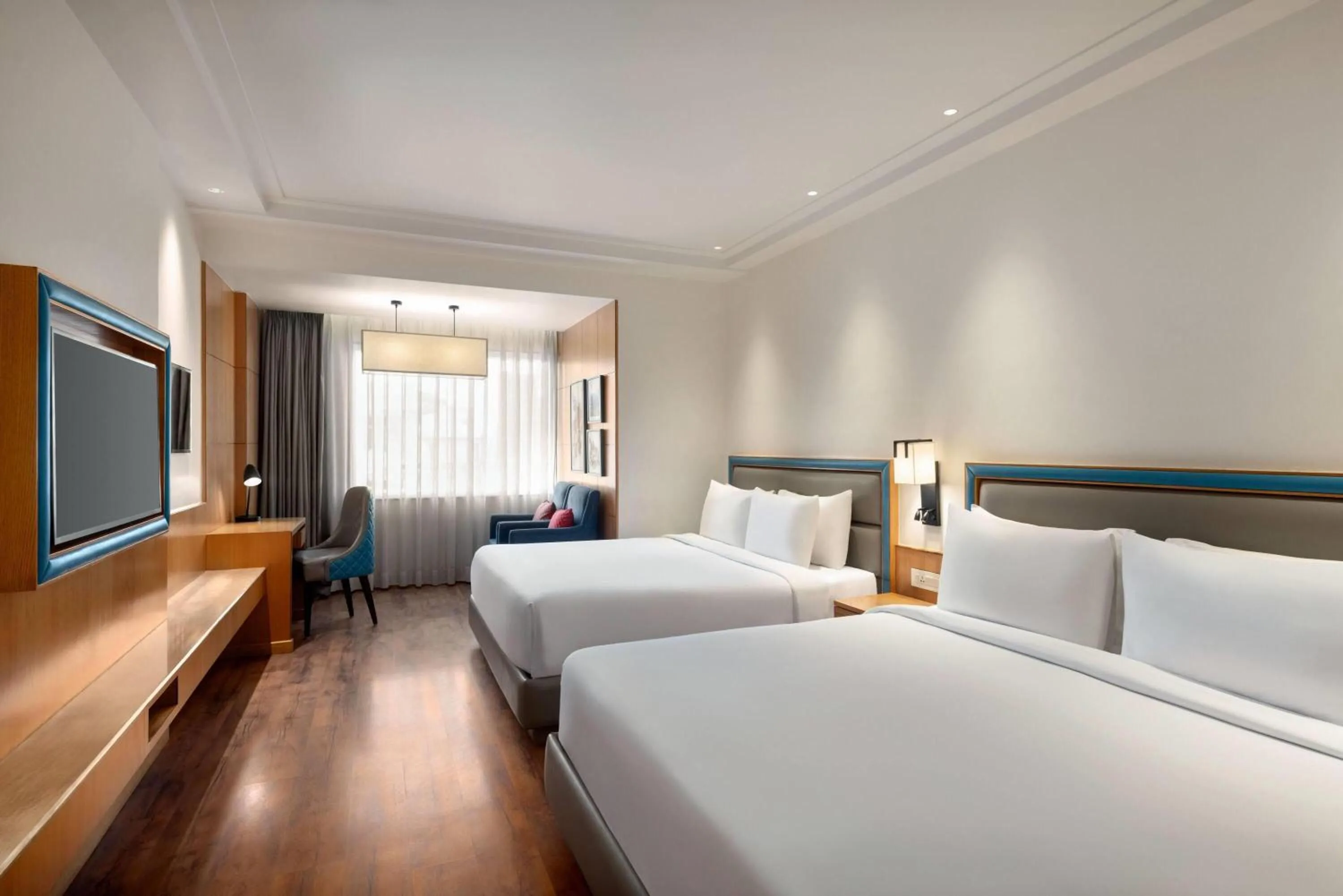 Photo of the whole room, Bed in Ramada by Wyndham Katra Station Road