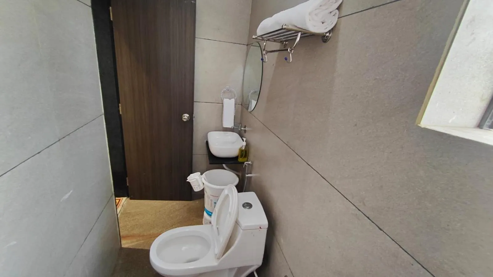 Bathroom in Asopalav Lawns