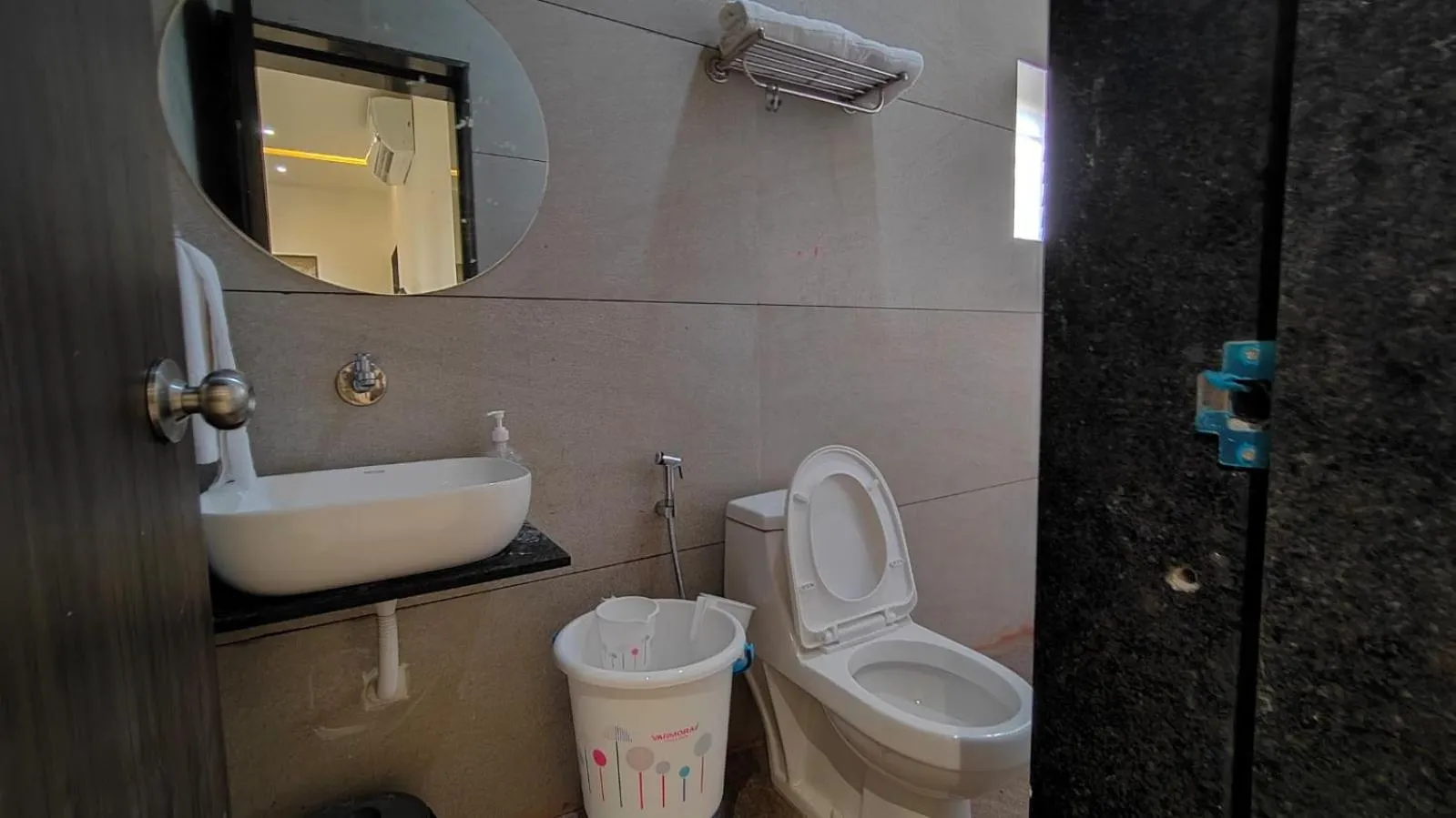 Bathroom in Asopalav Lawns