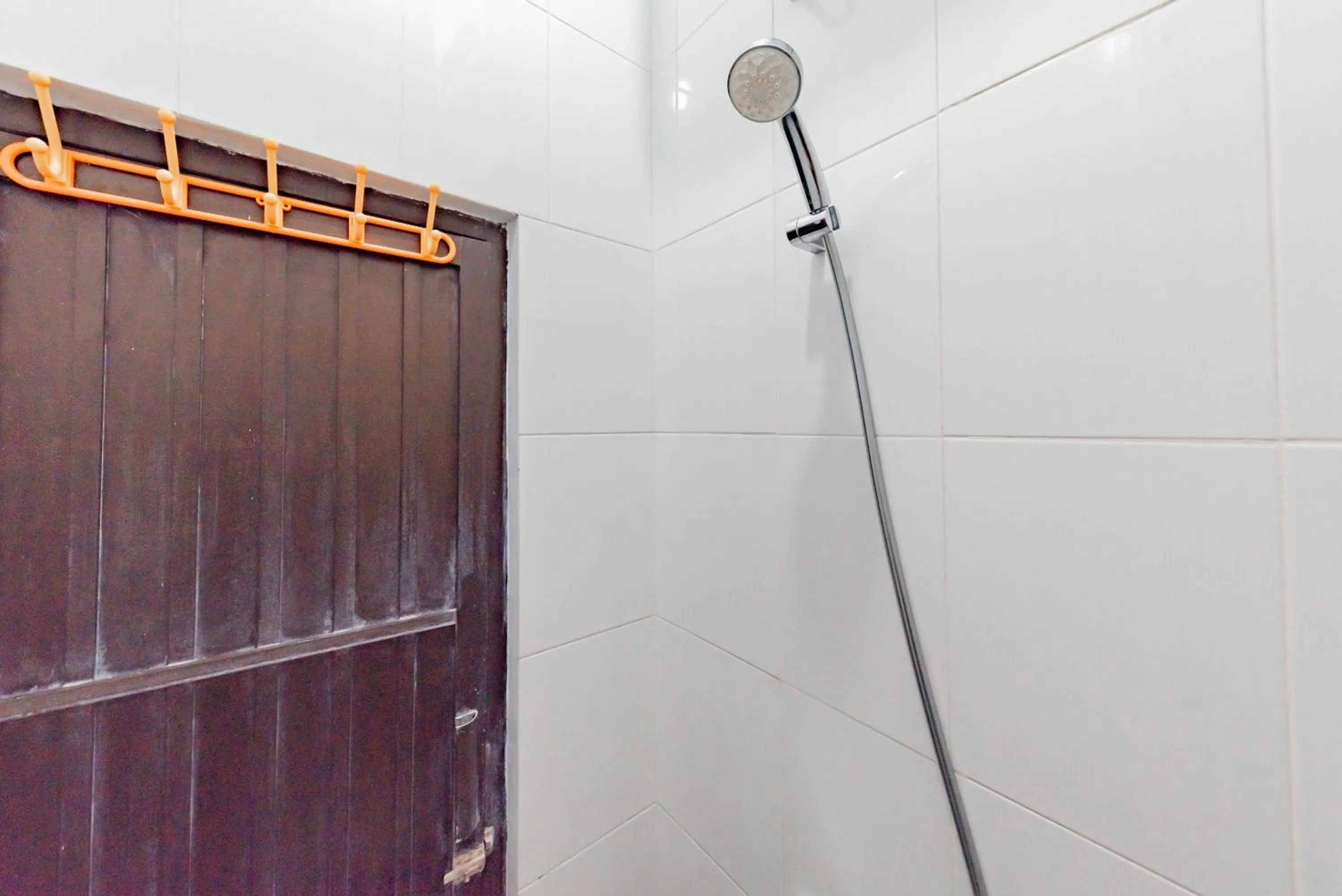 Bathroom in Urbanview Hotel Sunday Cirebon by RedDoorz