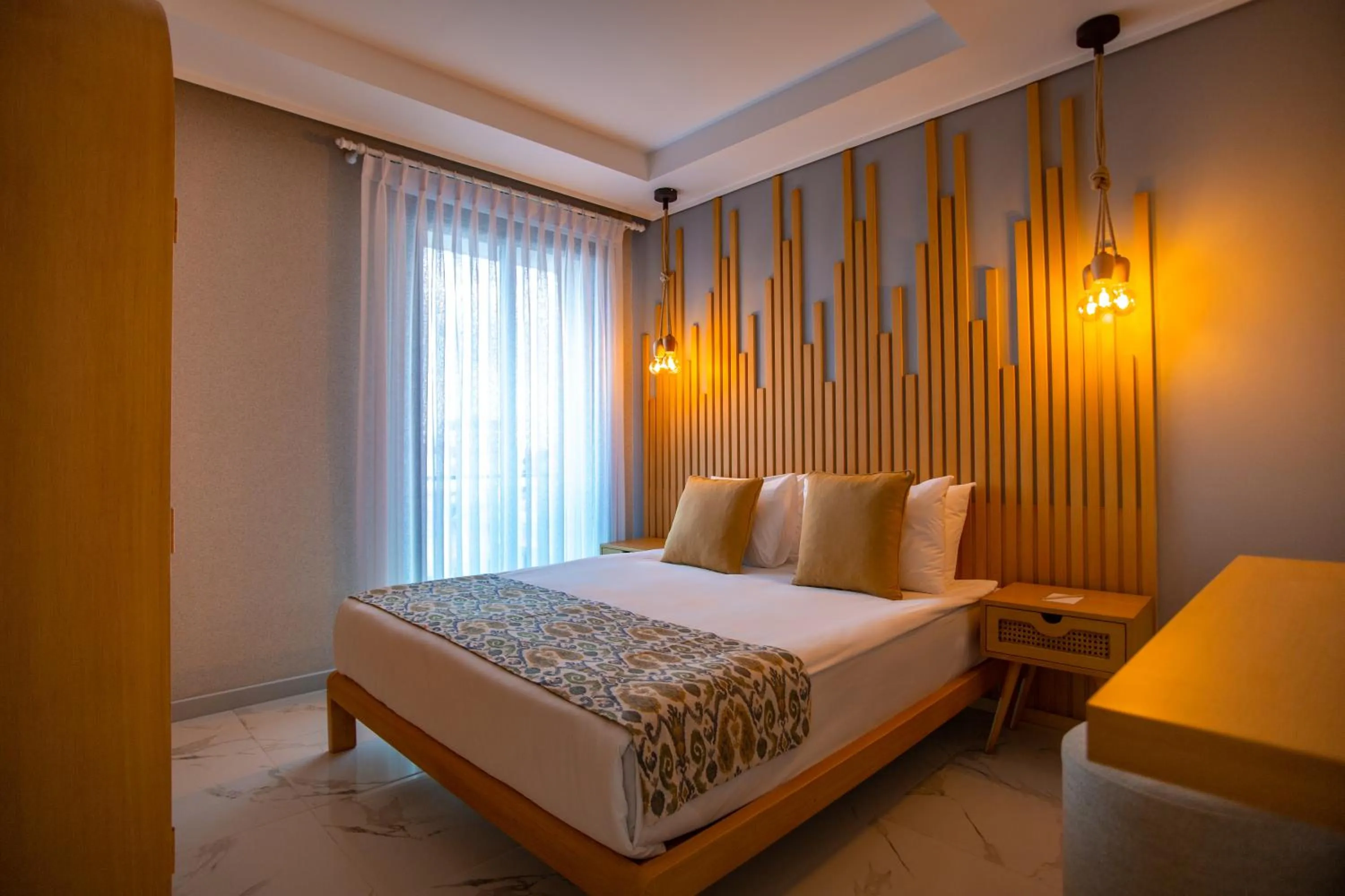 Bed in La Terrazza Hotel