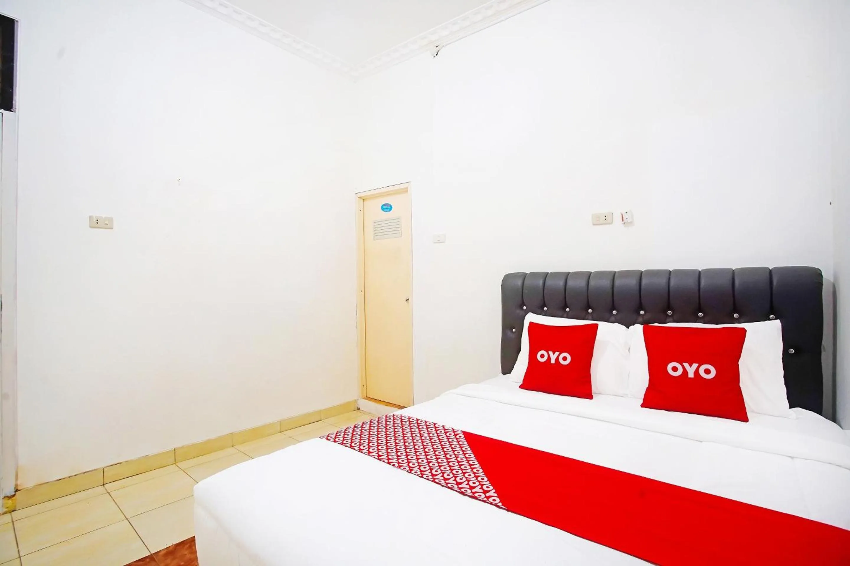 Bedroom in OYO 91460 Guest House Kencana Syariah