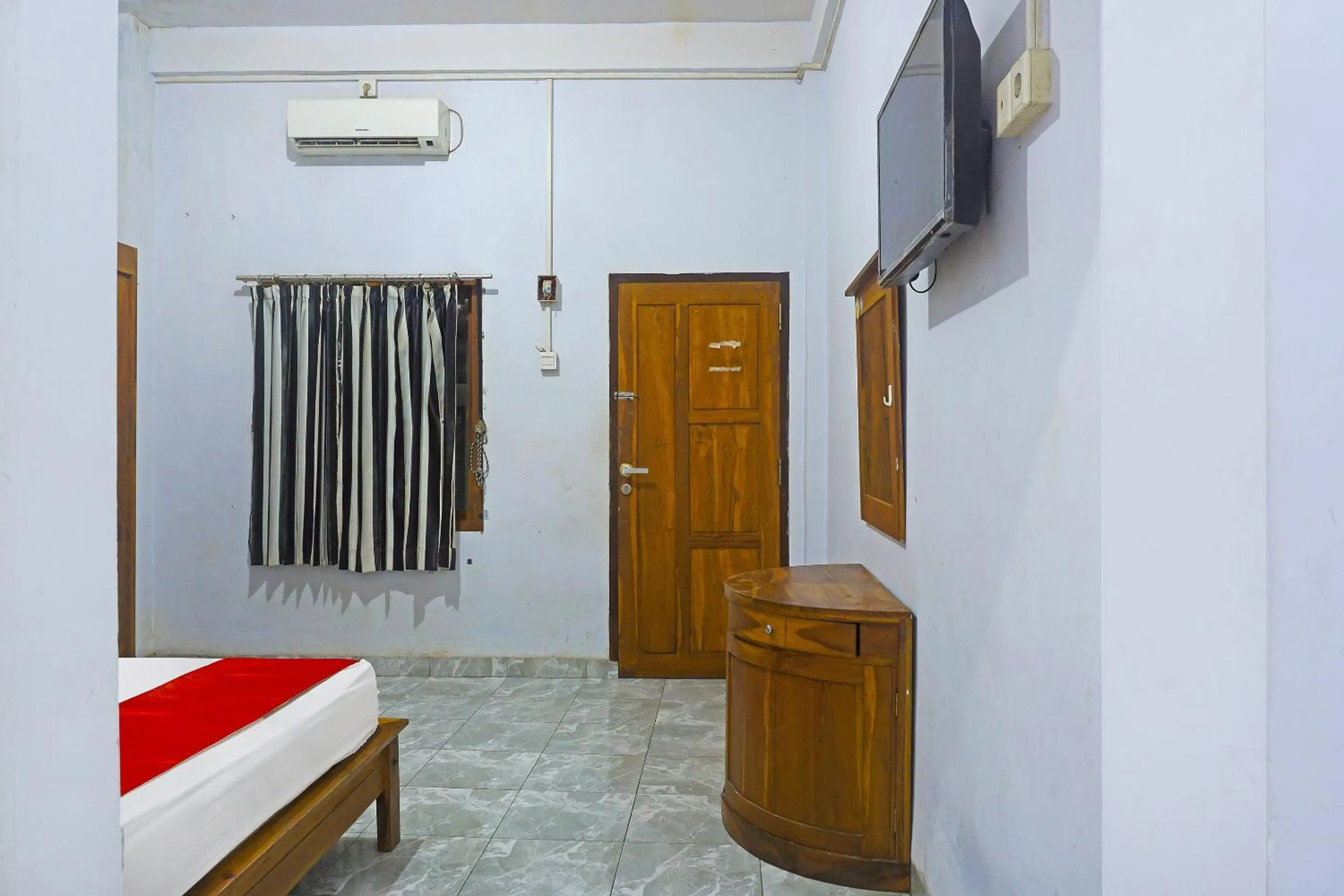Bedroom, Bed in Hotel O Anggrek Homes Makassar