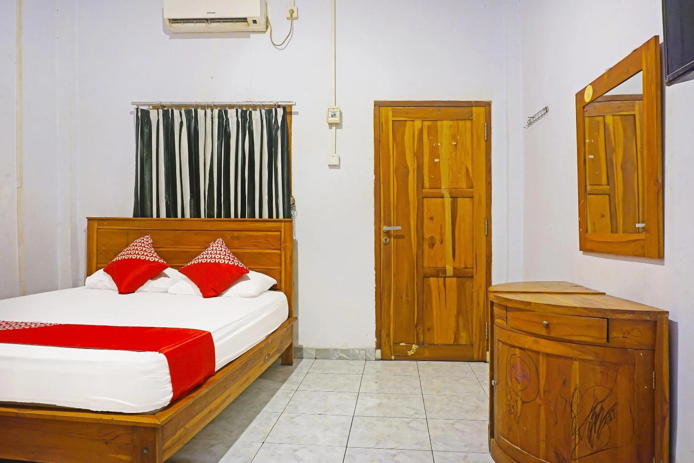 Bedroom, Bed in Hotel O Anggrek Homes Makassar