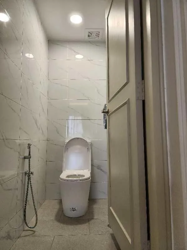 Toilet in SWISS AVENUE HOTEL