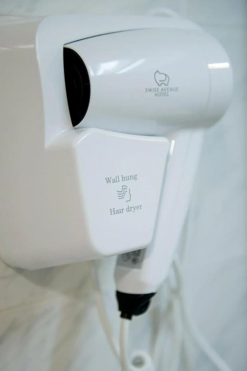 Toilet in SWISS AVENUE HOTEL