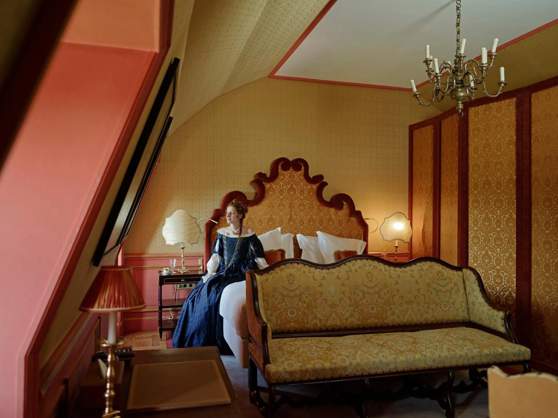 Bed in Relais & Château Louise de La Vallière