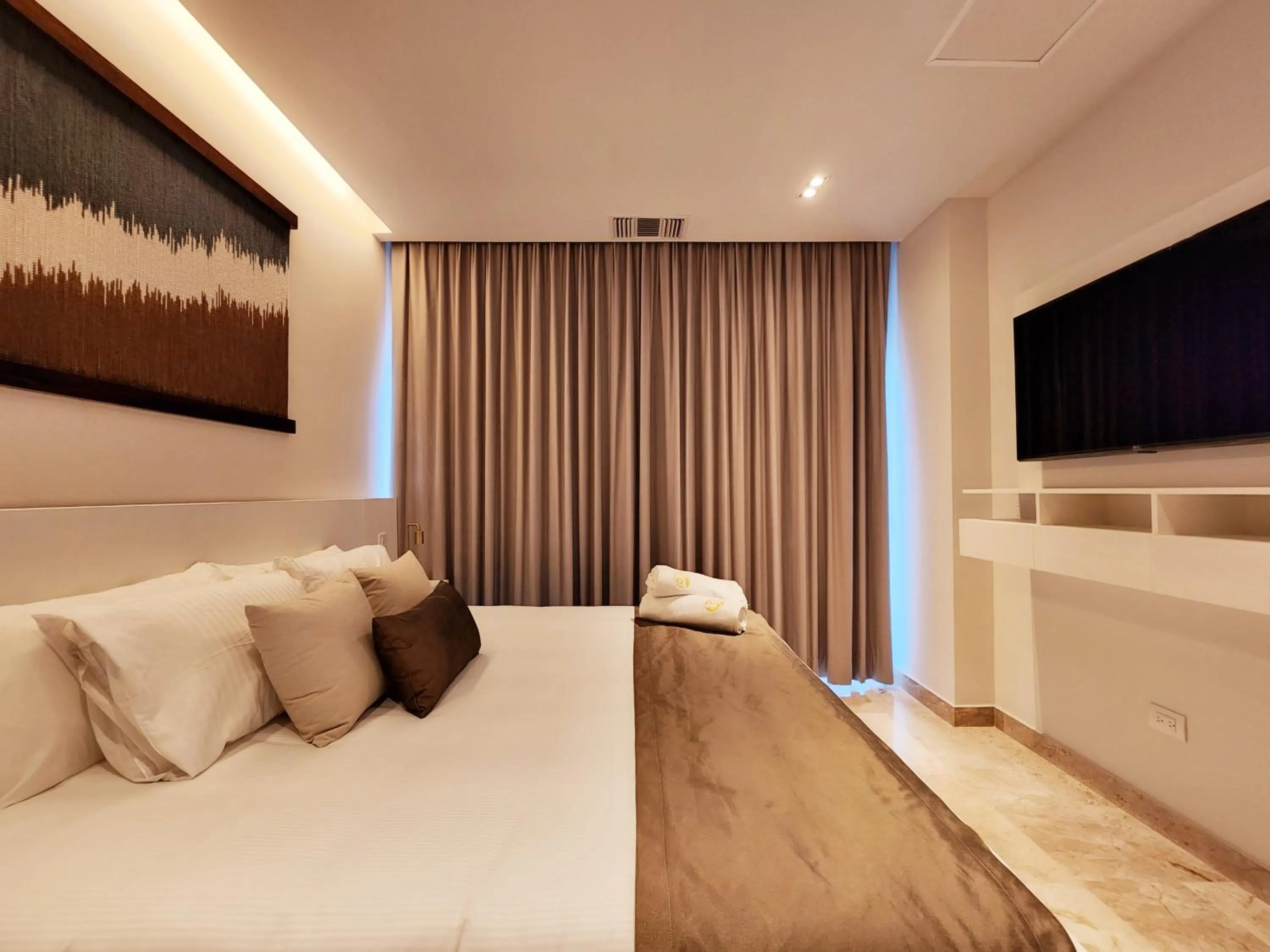 Bed in Singular Dream Beach Residences