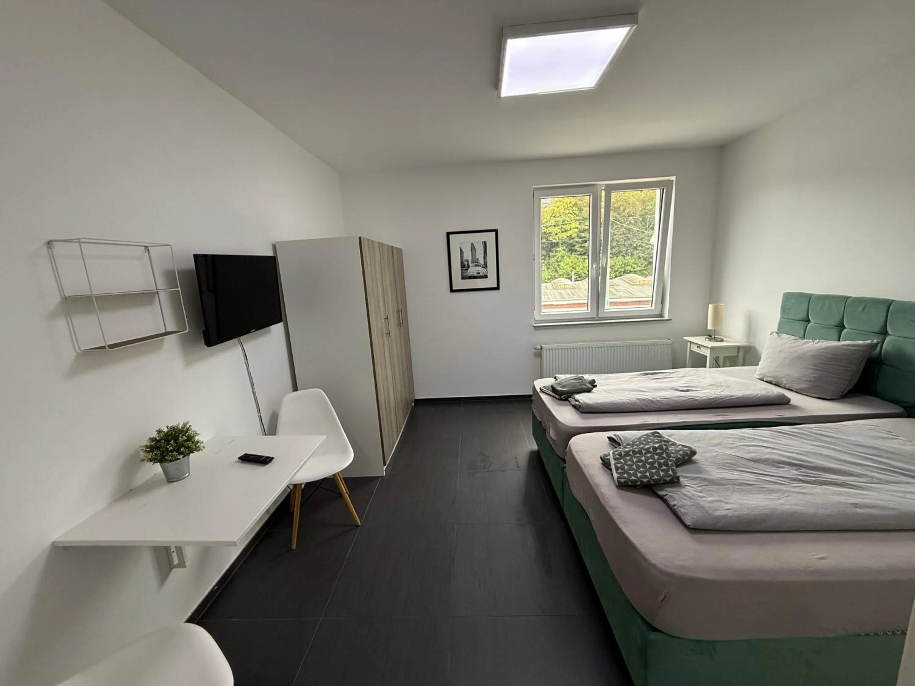 Photo of the whole room, Bed in Aparthotel Siegen