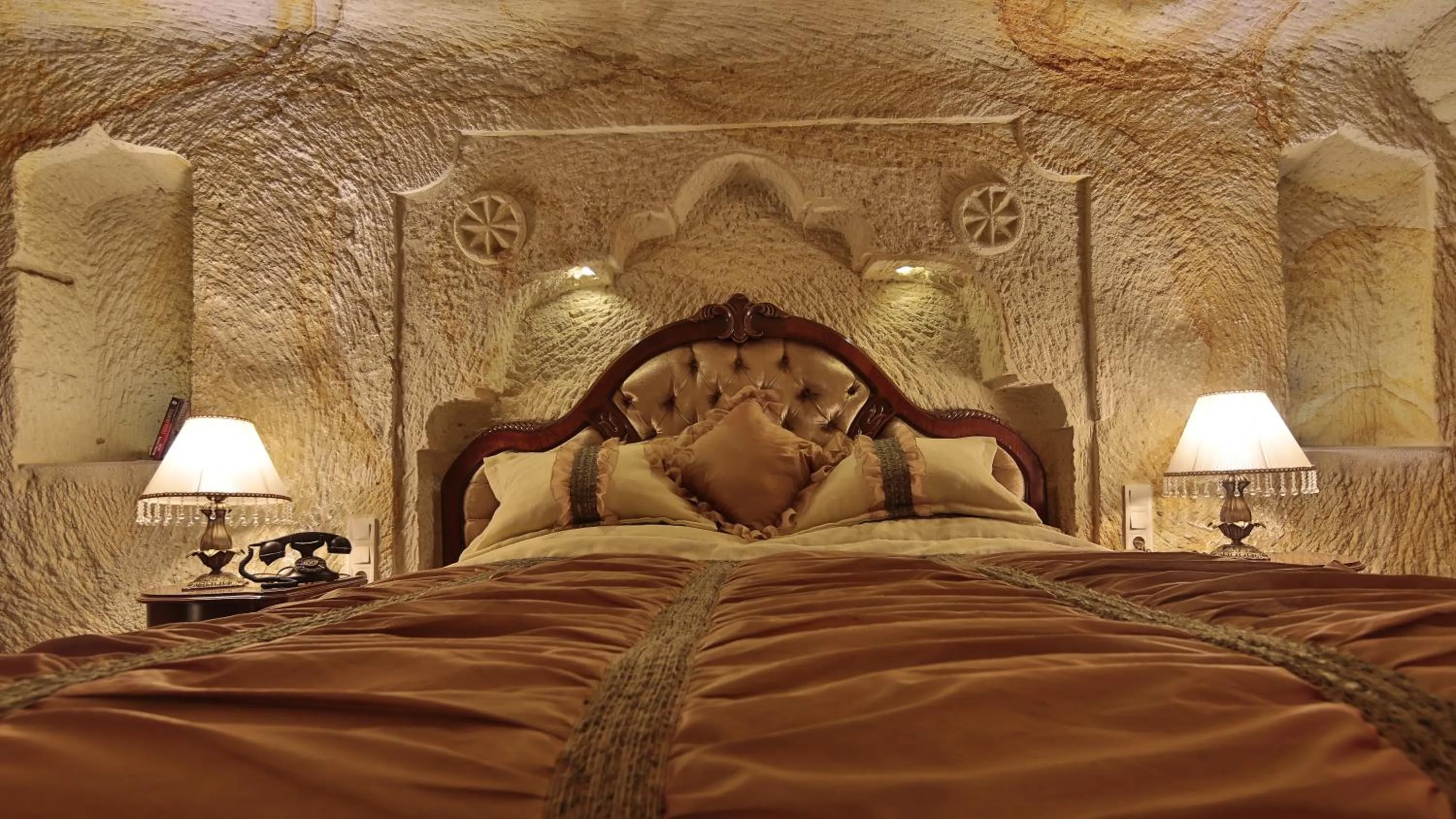 Photo of the whole room, Bed in Golden Cave Suites