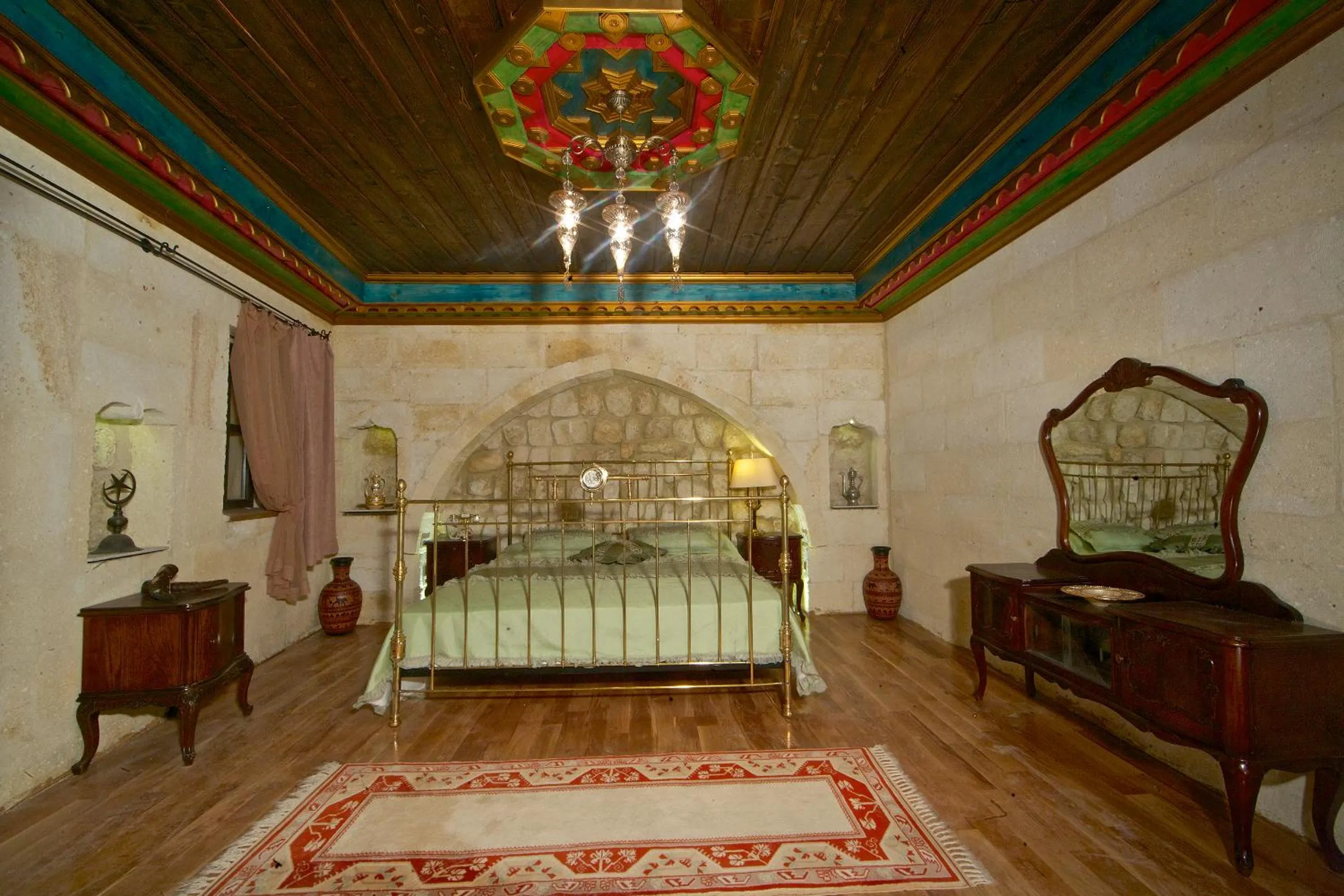 Bed in Golden Cave Suites