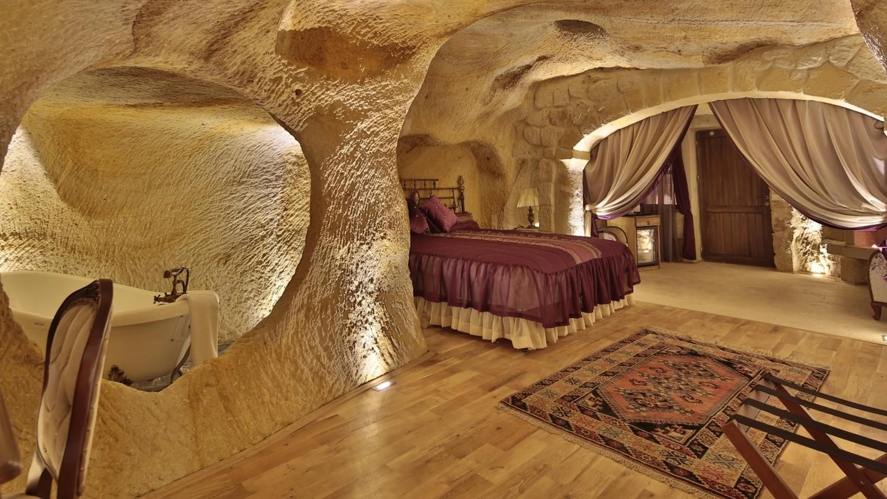 Photo of the whole room, Bed in Golden Cave Suites