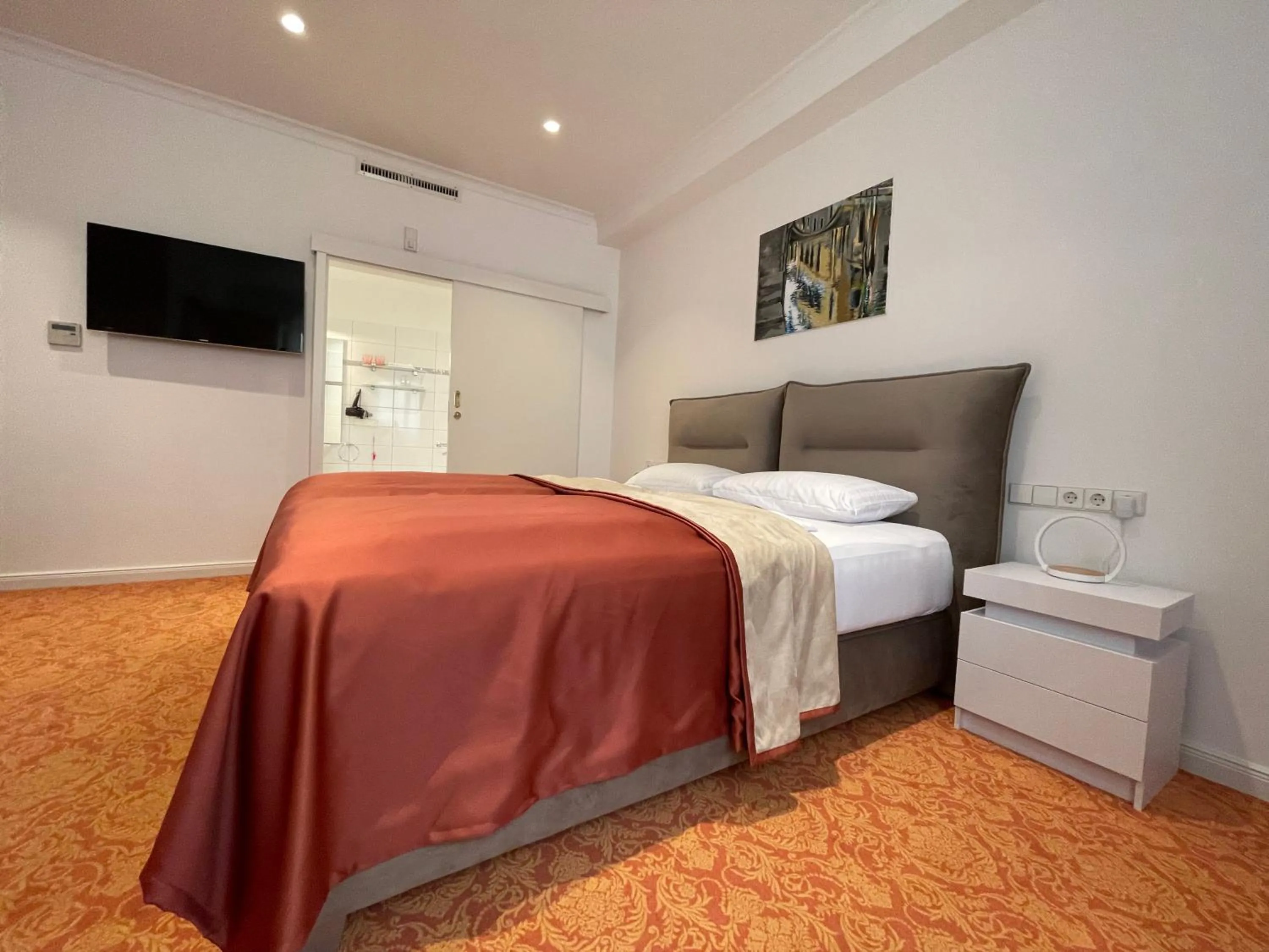 Bed in ART HOTEL HOUSE ONE