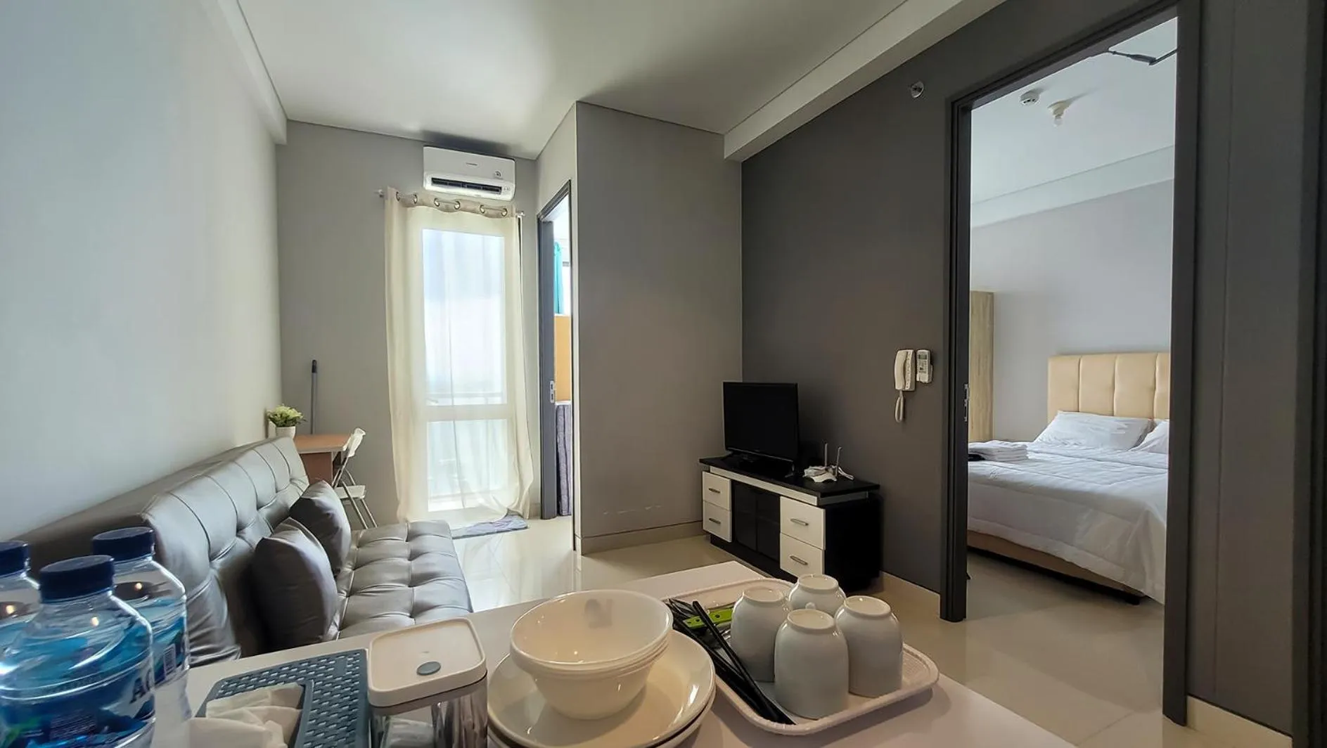 Living room, Bed in Palam Mansion at Apartment One Residence