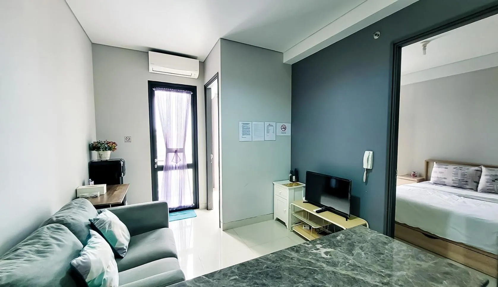 TV and multimedia, Bed in Palam Mansion at Apartment One Residence