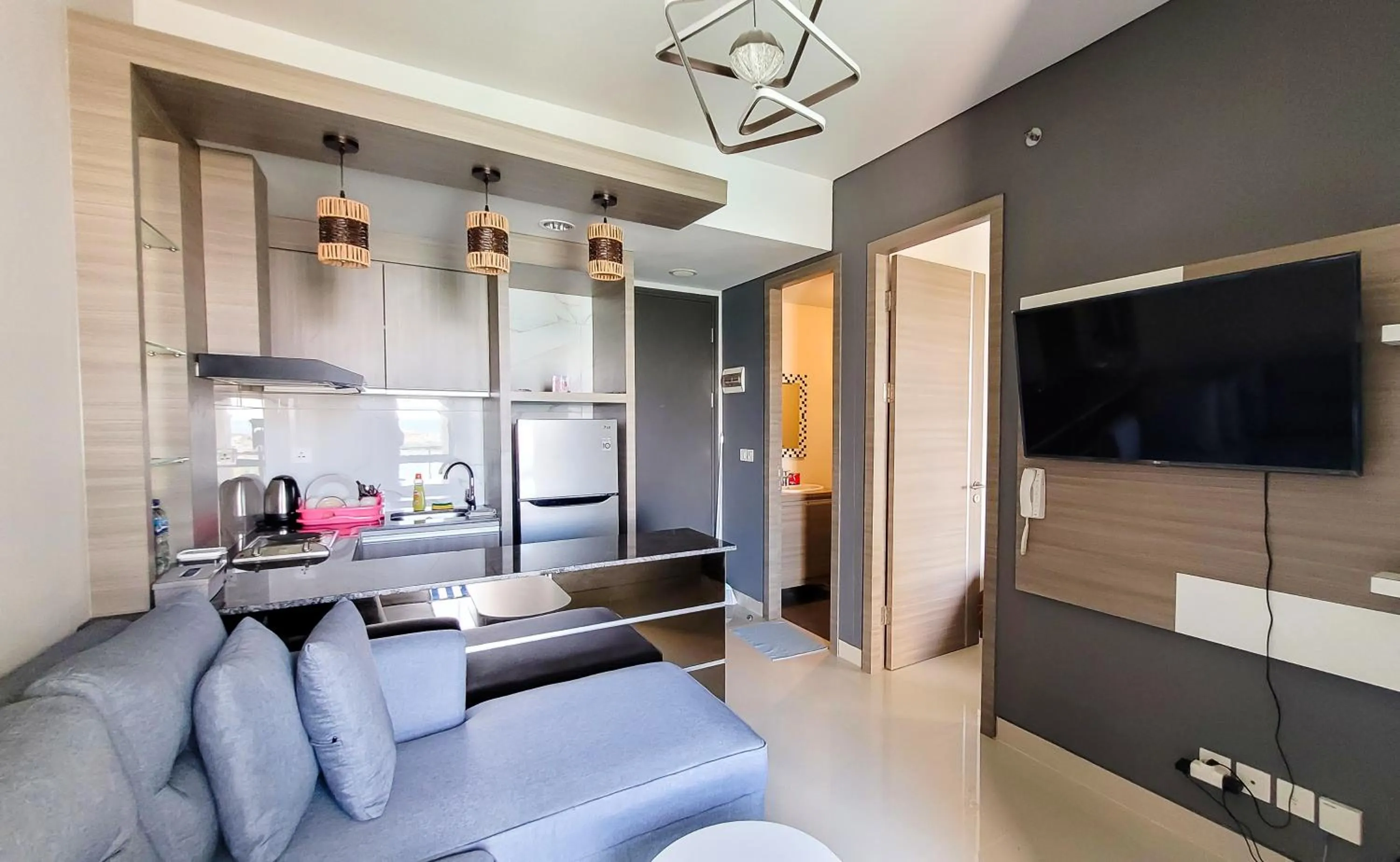 Communal lounge/ TV room in Palam Mansion at Apartment One Residence