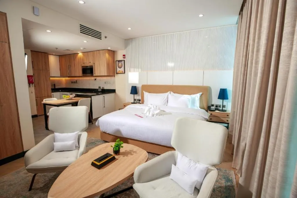 Bed in Royal Mansoura Residence Hotel