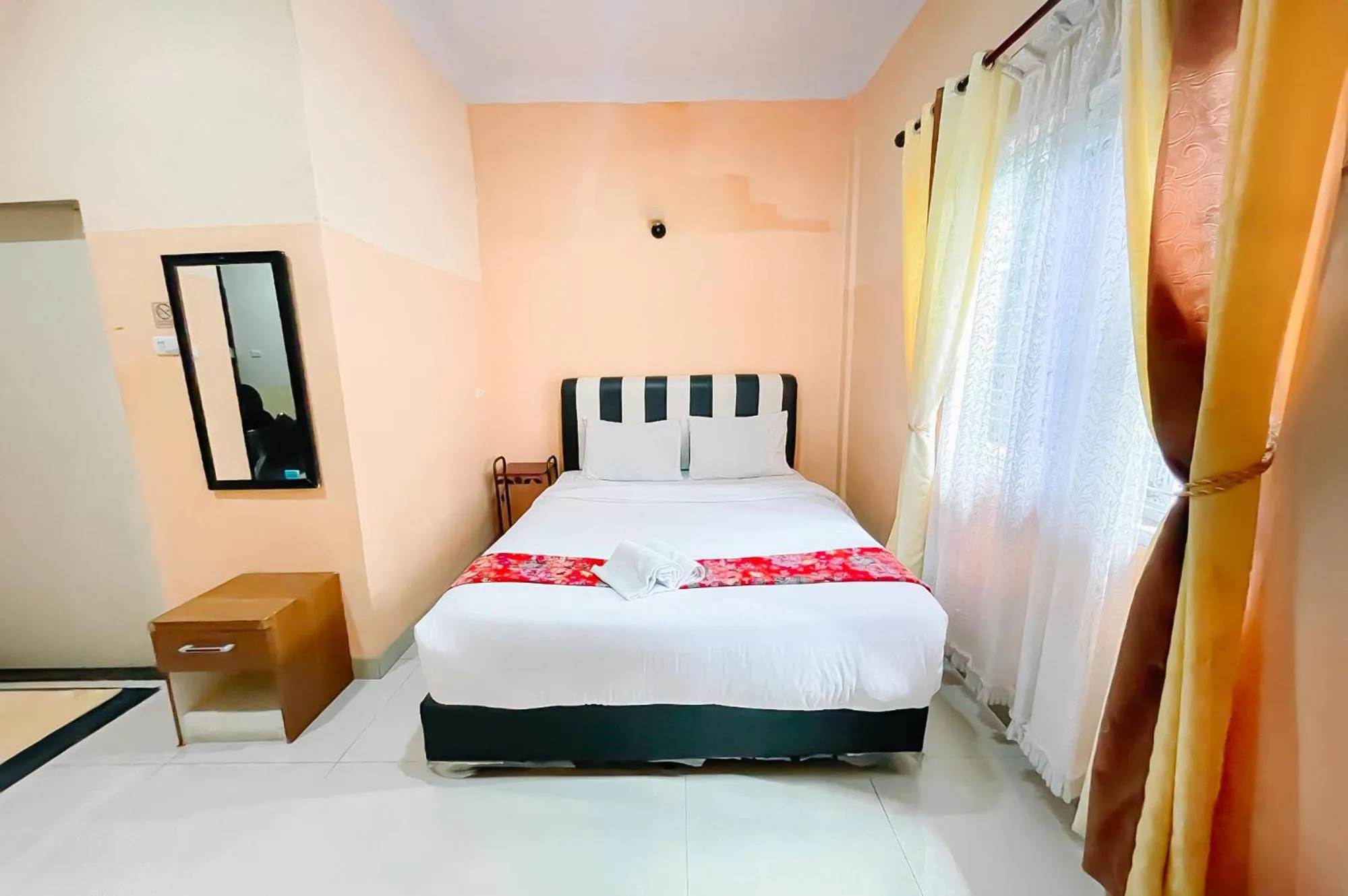 Bed in Hotel New Dieng By Helocus