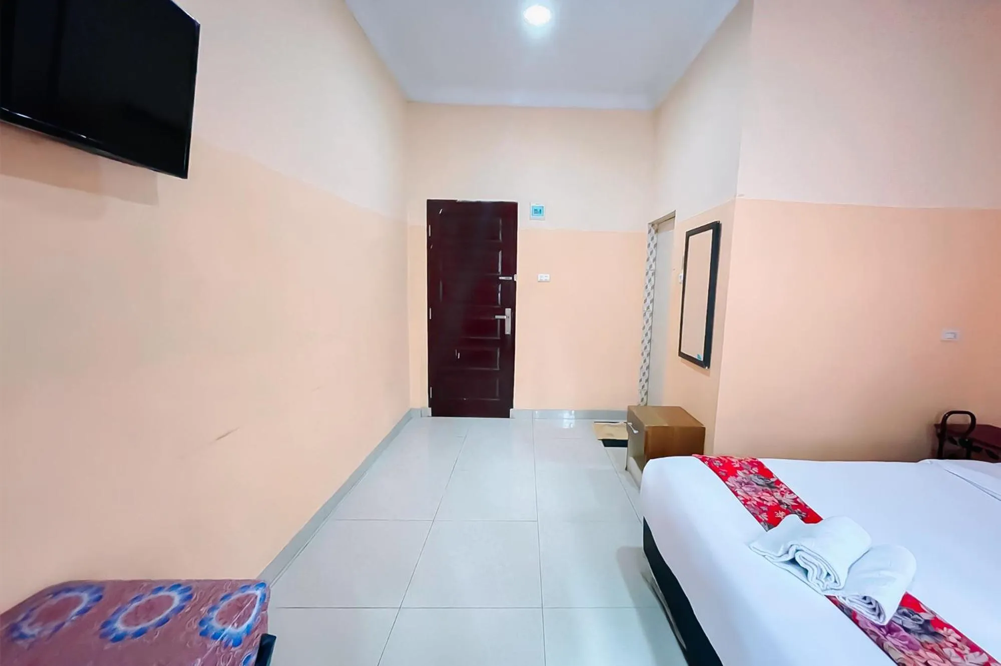 Bed in Hotel New Dieng By Helocus