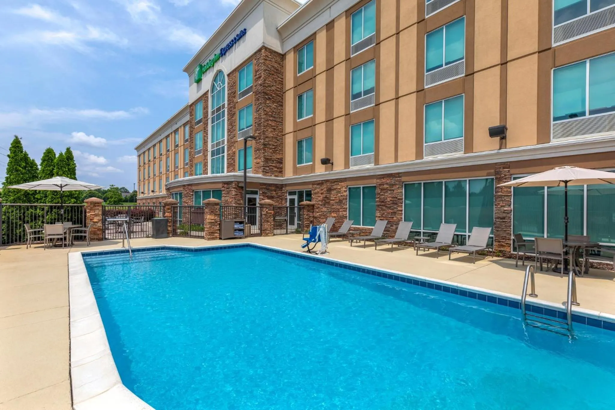 Swimming pool in Holiday Inn Express Hotel & Suites Huntsville West - Research Park by IHG