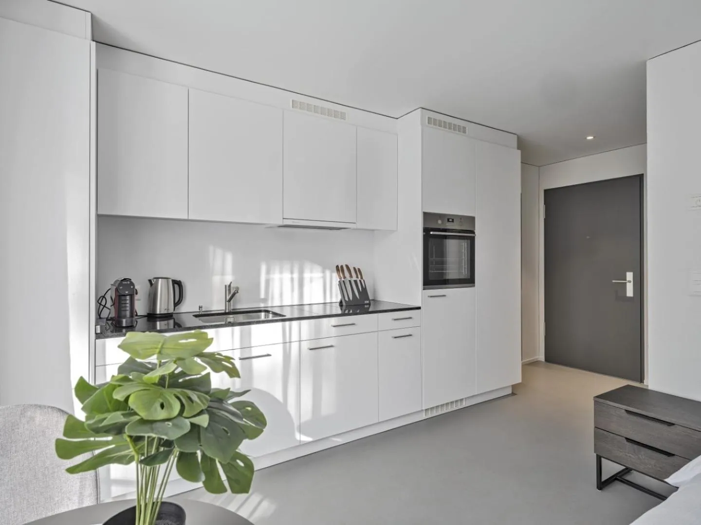Kitchen or kitchenette in MOOI Apartments Grenchen