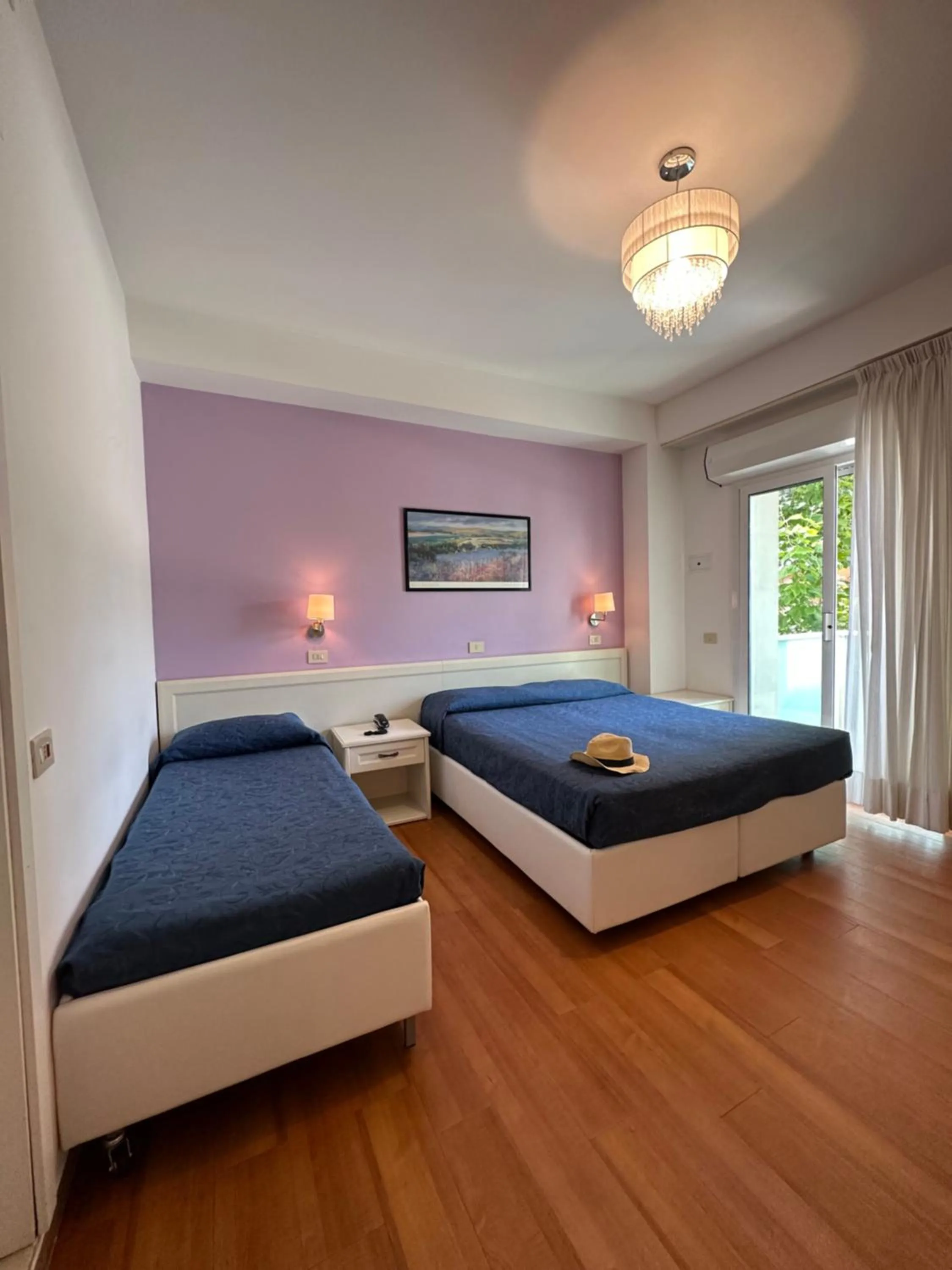 Bed in Hotel Mon Pays