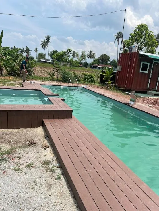 Pool view in HOMESTAY Kampong KOTA AUR Resort with swimming pool, Kepala Batas, SEBERANG PERAI, PENANG -MOTAC registered Awarded ASEAN homestay standard Malaysia AWARD 2023-2028 Only 3 minutes from viral KG AGONG